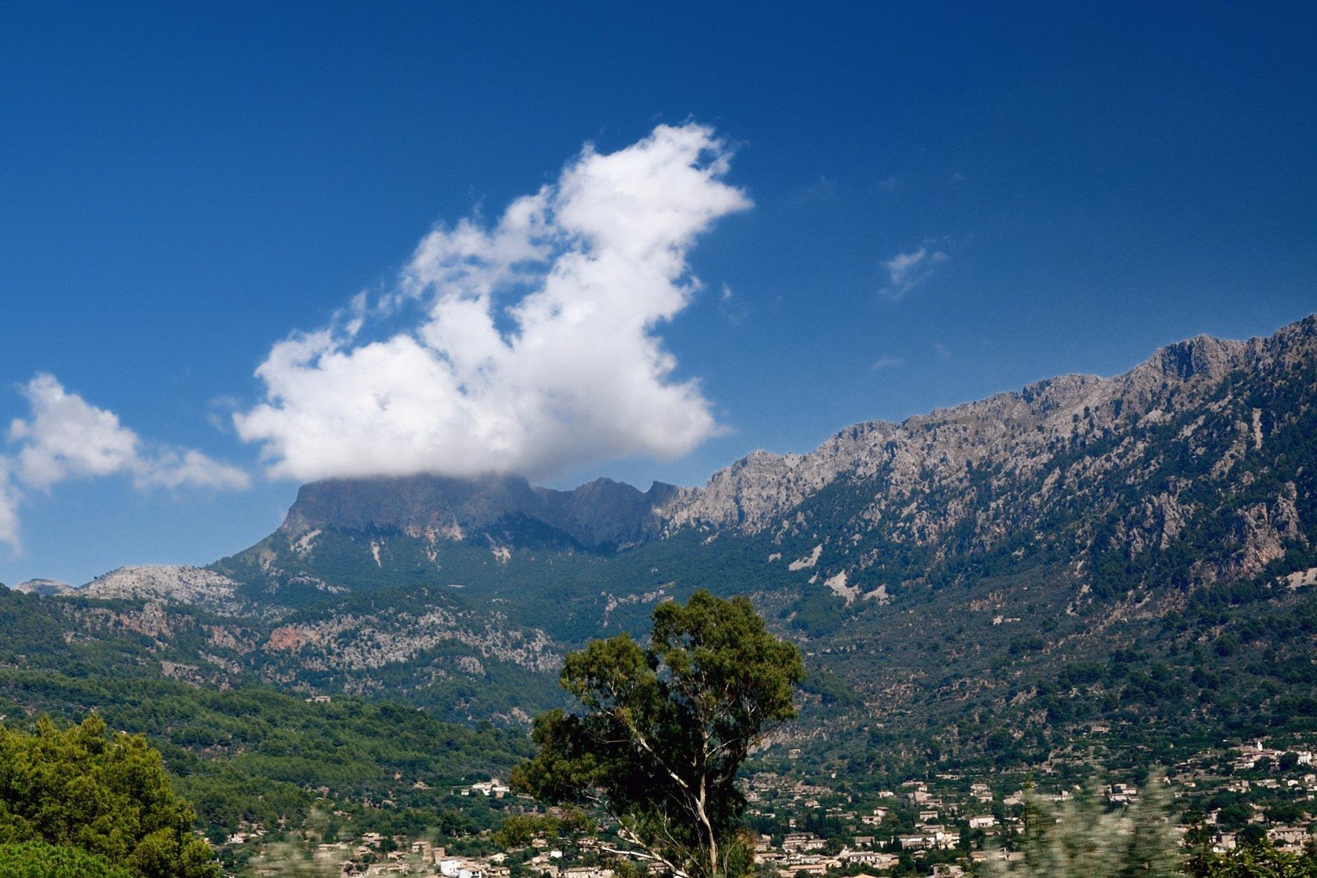 View from the foot of Serra de Tramuntana, overlooking the mountain village of Fornalutx