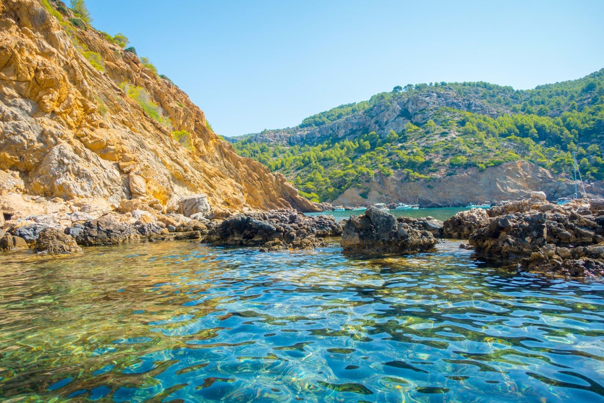 Port d'Andratx with its crystal clear waters and blue sky