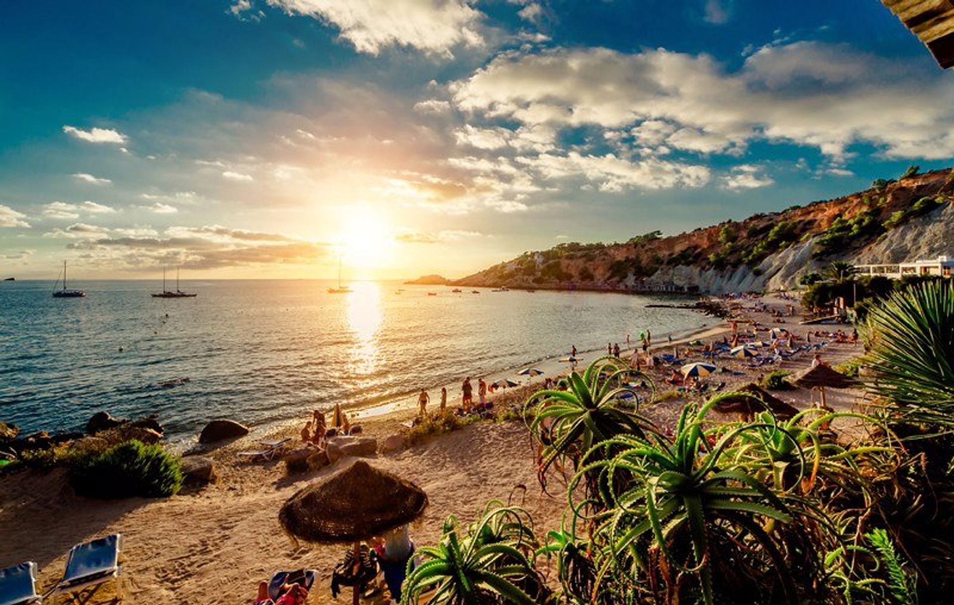 Cala d'Hort beach on the southwestern coast at sunset