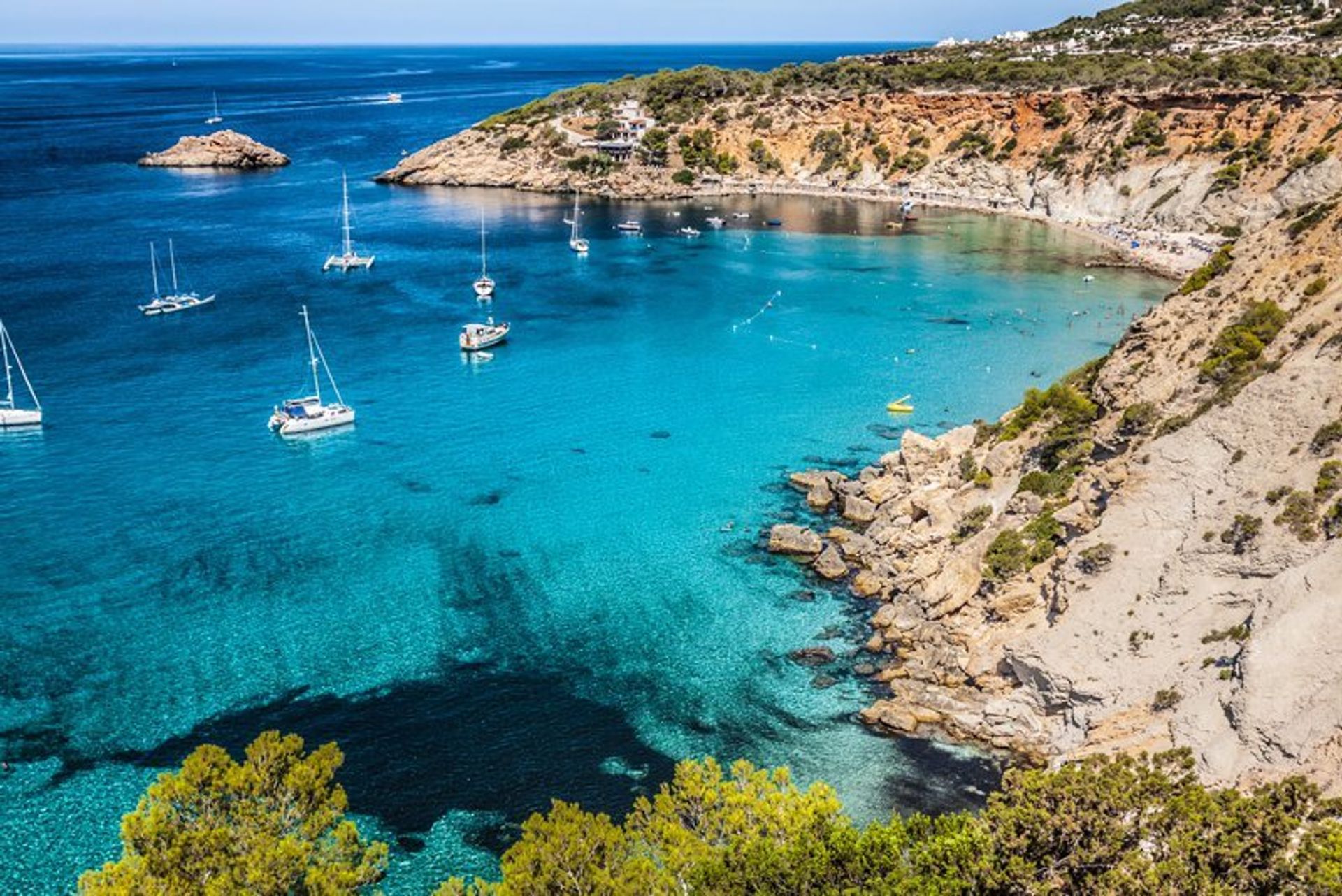 The crystal clear waters of the southwestern coast of Ibiza, with its scattered islets