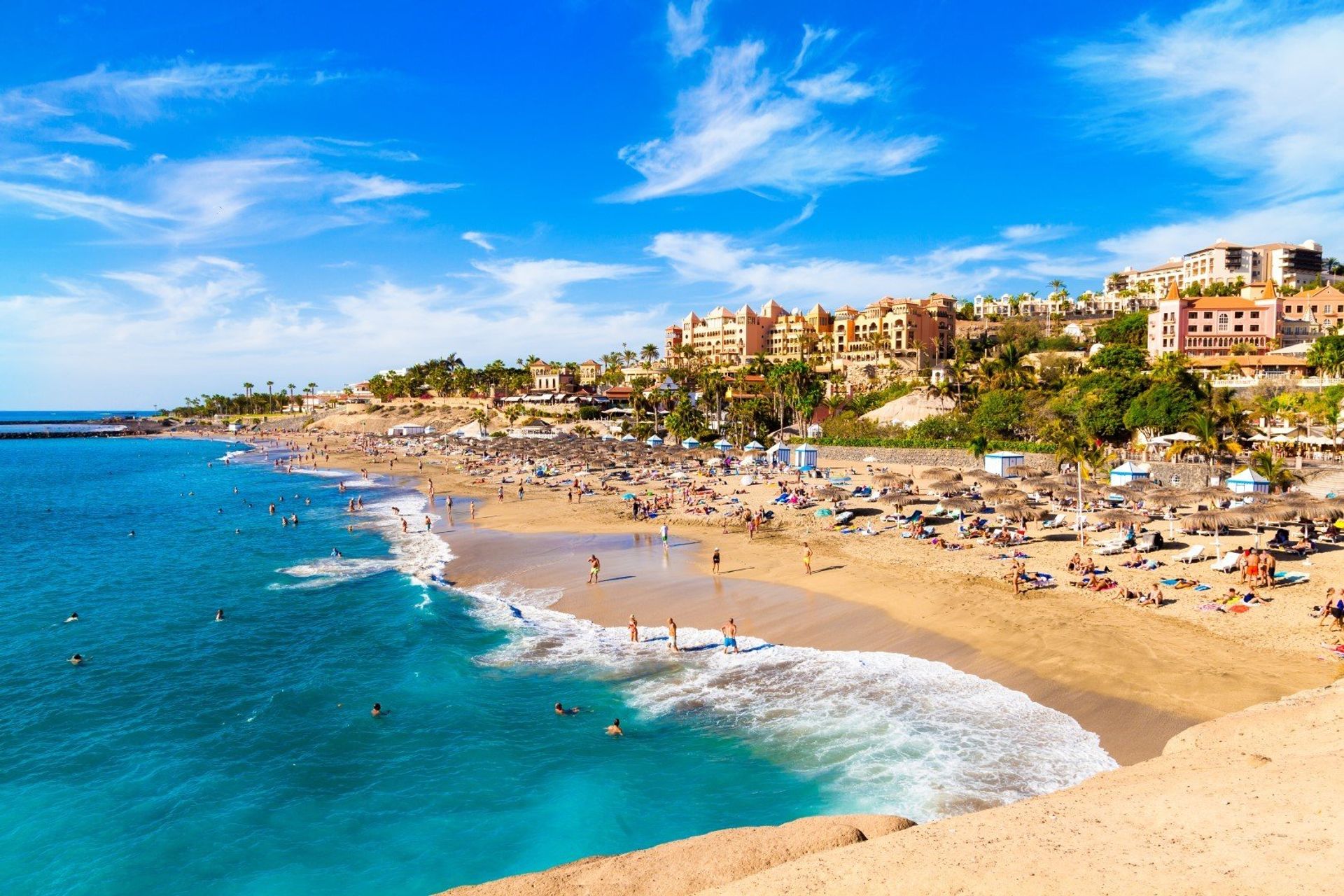 Enjoy the vast stretch of golden sand and turquoise waters on Costa Adeje in Tenerife