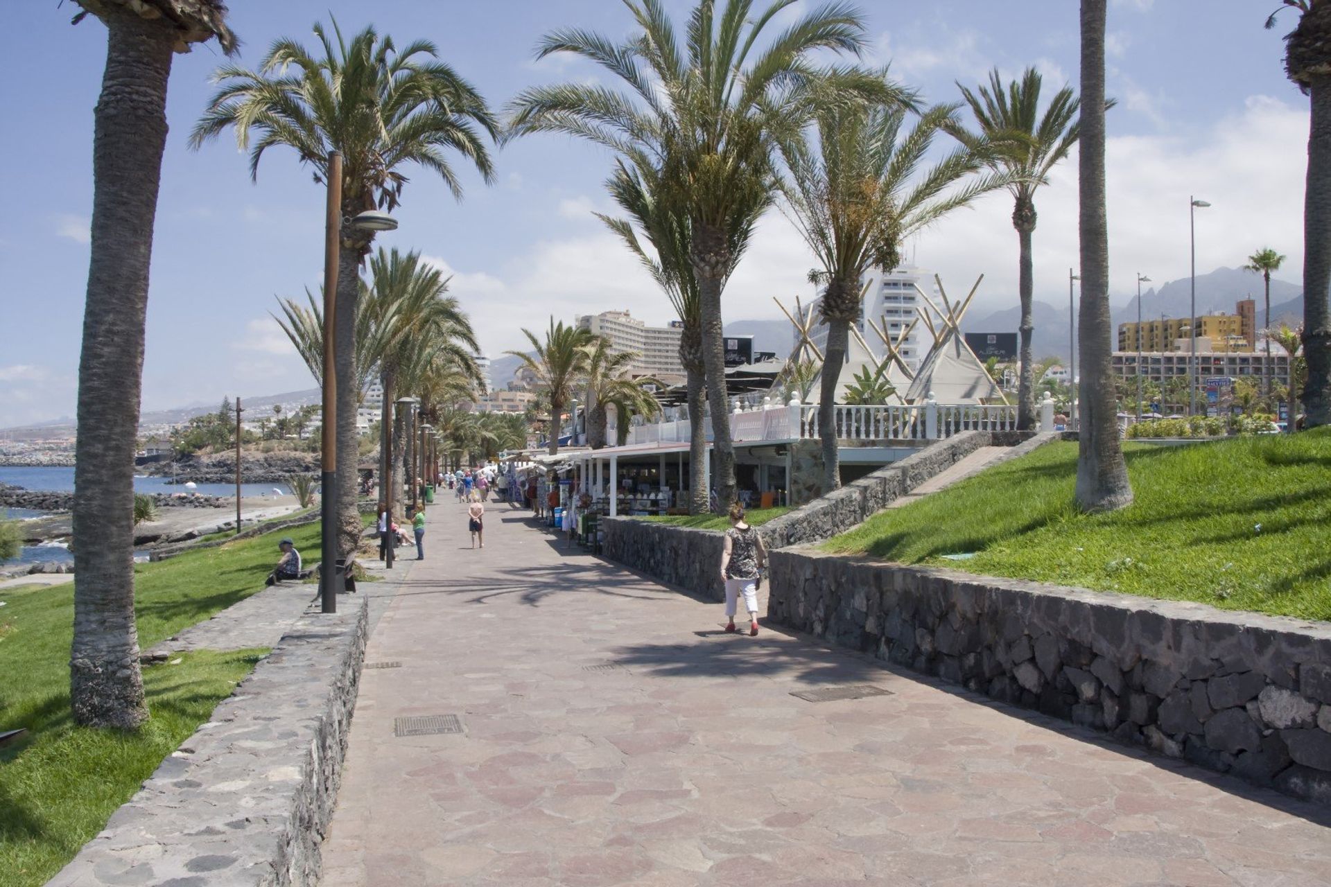 Playa de las Americas' beach promenade known as 'The Golden Mile', with its stretch of restaurants and boutiques