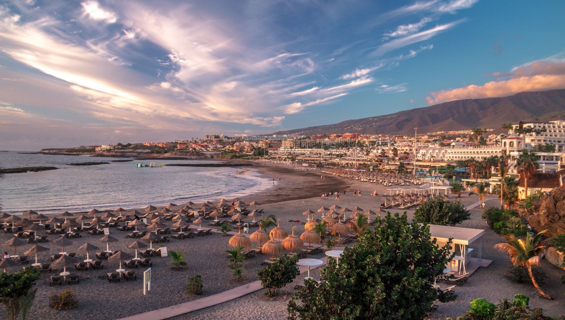 Nearby Playa de las Américas, one of the many natural beaches in Tenerife 