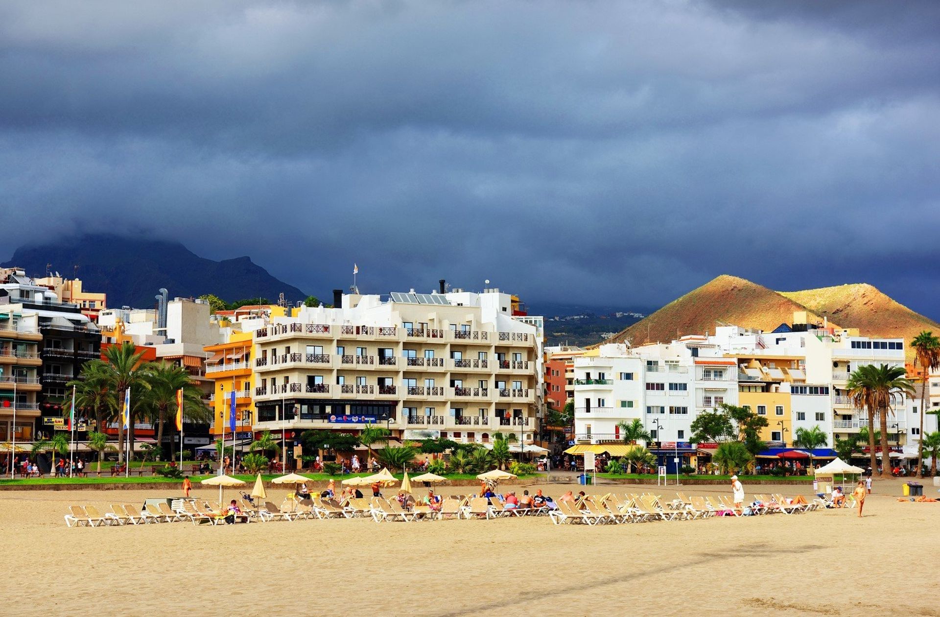 The moody skyline over Los Cristianos resort with the view of Guaza mountain 