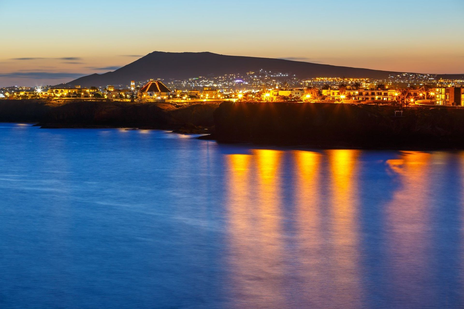 Sunset over the famous Playa Blanca resort, 30 minutes from Lanzarote Airport