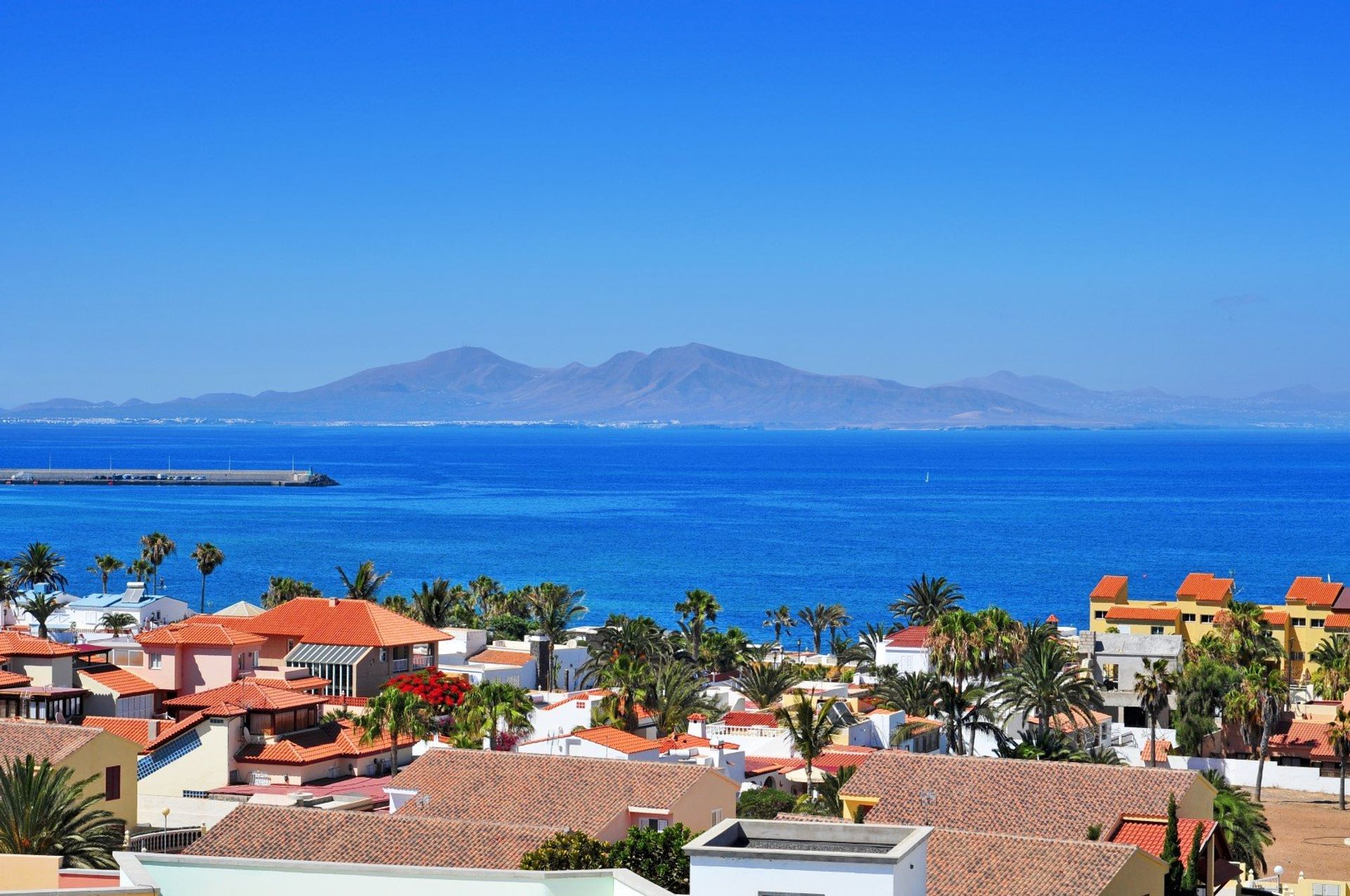 Whitewashed Corralejo town in La Oliva district, overlooking Lobos Island