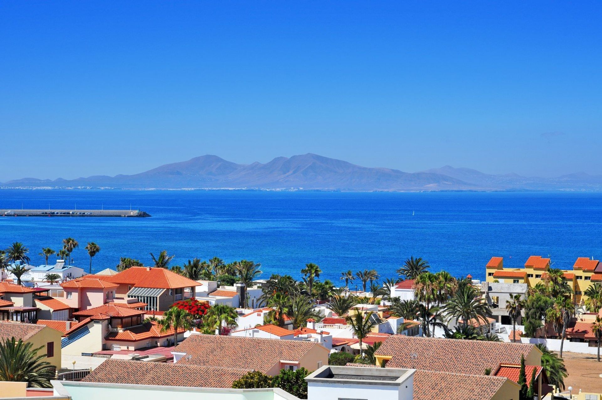 Whitewashed Corralejo town in La Oliva district, overlooking Lobos Island