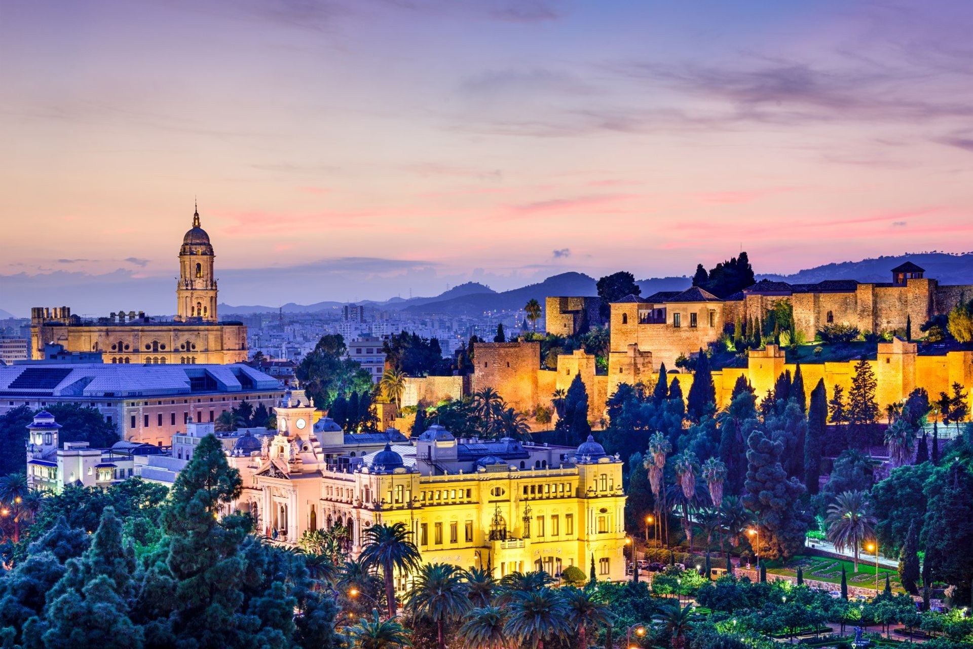 Malaga metropolis, one of the most popular rivieras in Andalucia, at sundown
