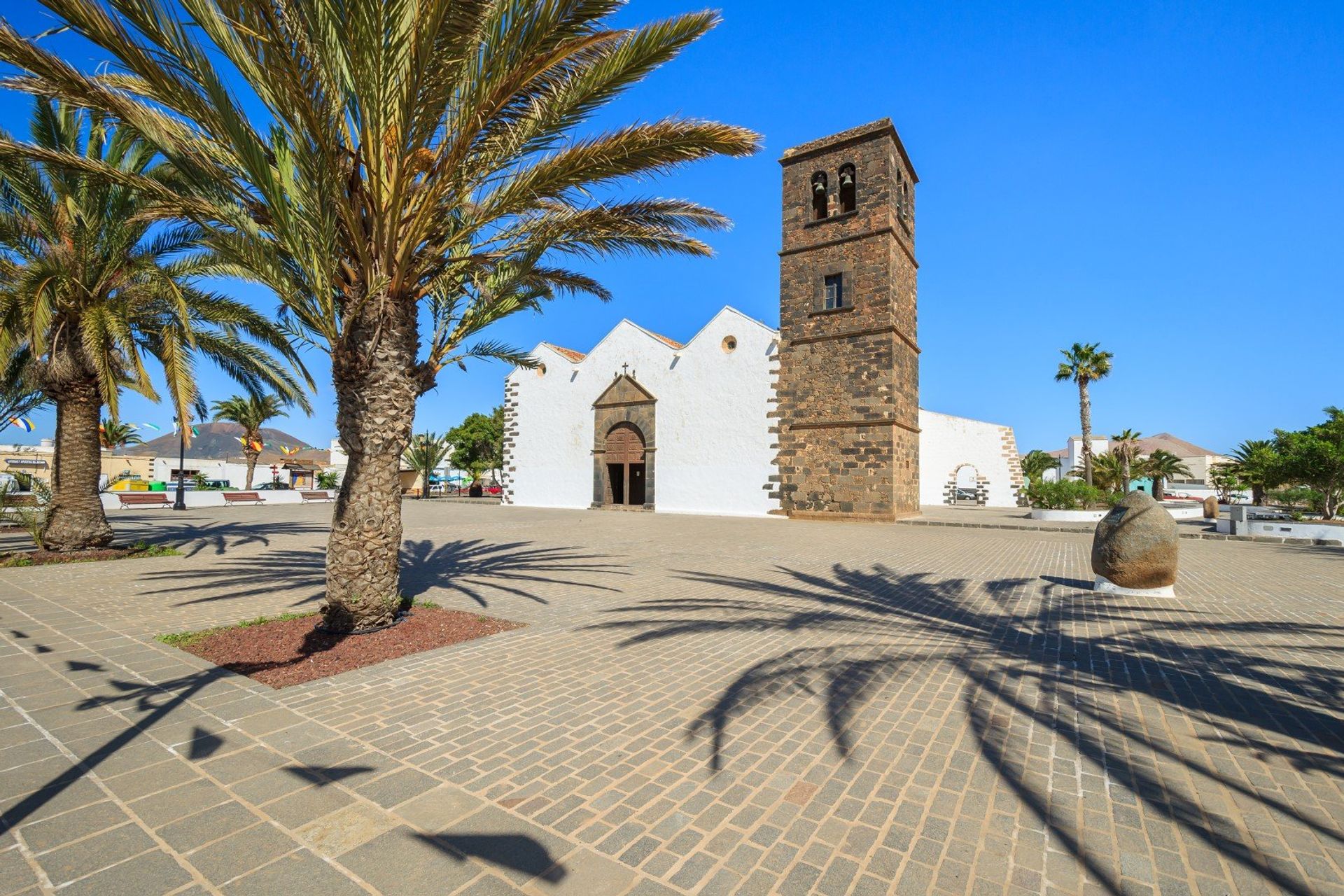 A typical Canary style church built from volcanic stone in La Oliva village 