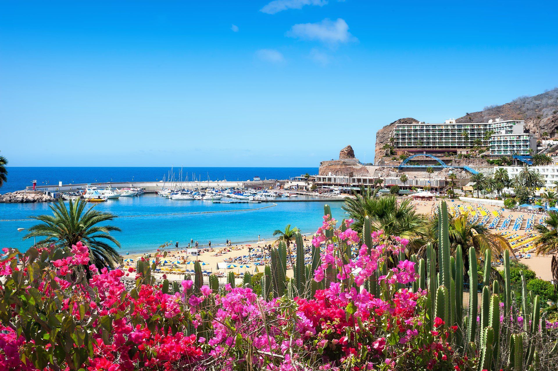 The turquoise waters and tropical garden of Puerto Rico resort, Gran Canaria