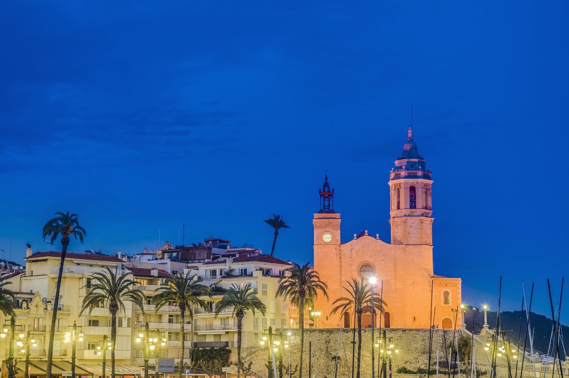 The beautiful church of Sant Bartomeu at night, Sitges, southwest of Barcelona.