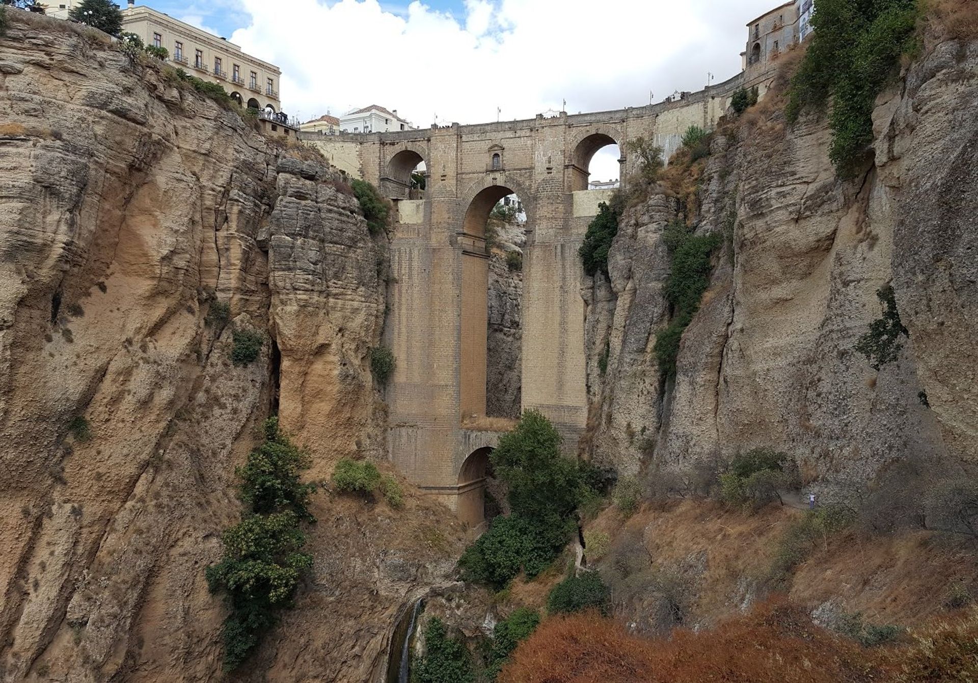 120m high Ronda bridge, nestled in the Serranía de Ronda mountain range