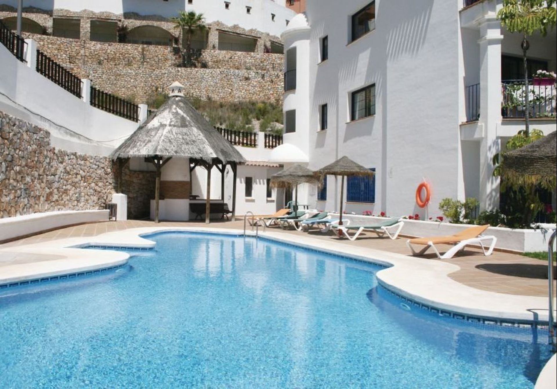 A beautiful 2-bedroom apartment with shared pool near the golf