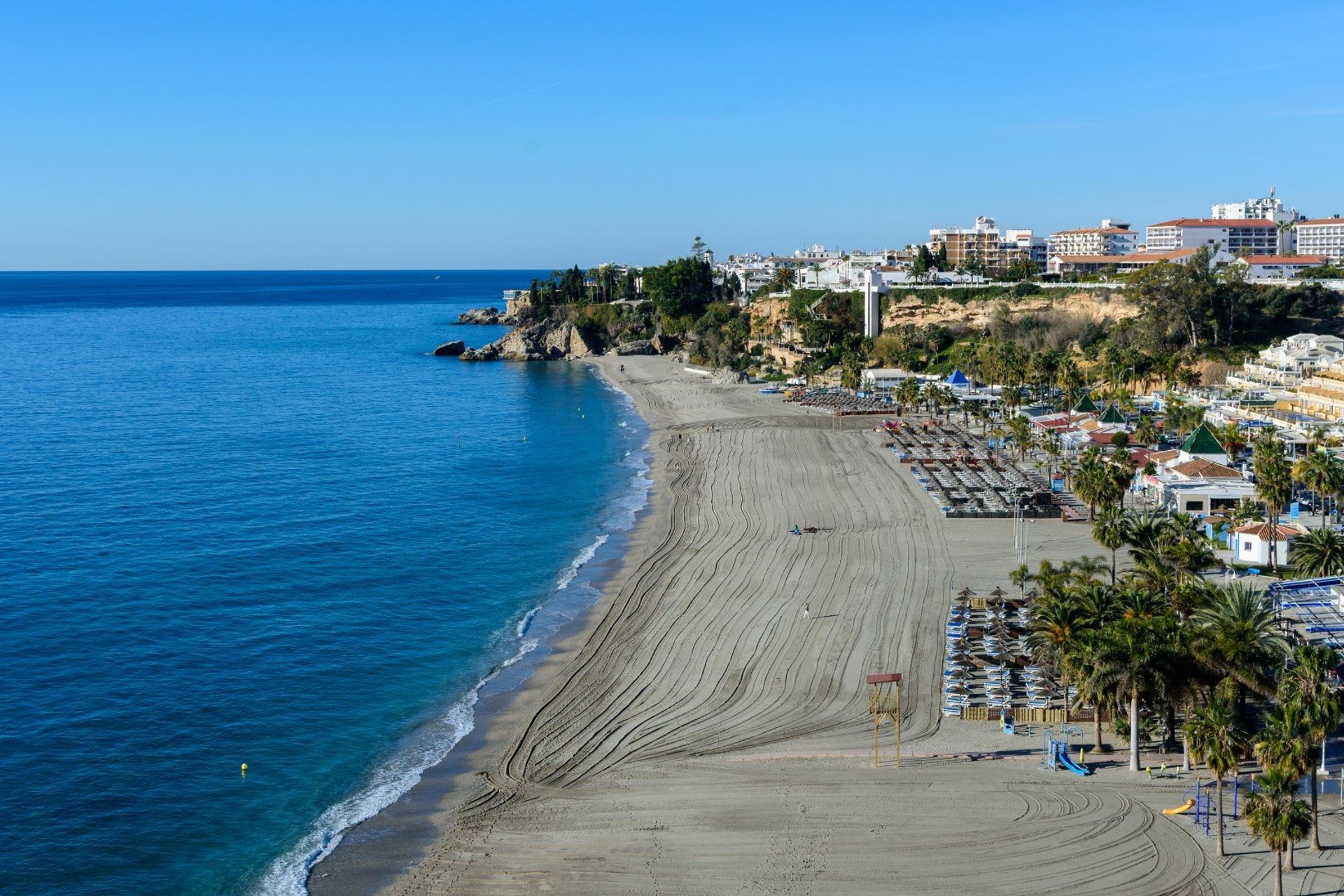 Burriana beach in Nerja offers boat rentals, water sports and restaurants, 5 minutes from the town centre