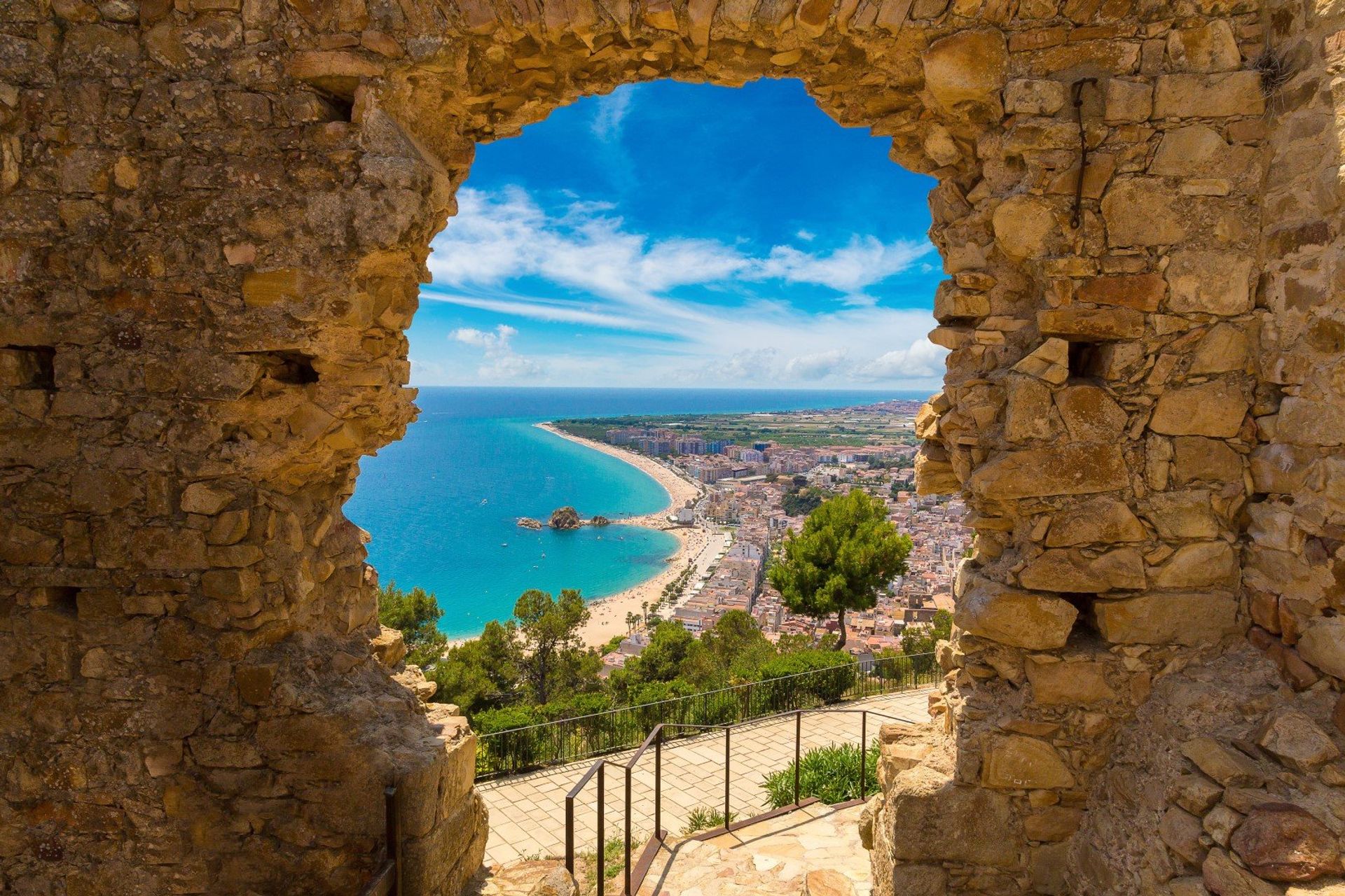 The gateway to the Costa Brava! Blanes and its surrounding landscape, seen through the wall of St. John Castle