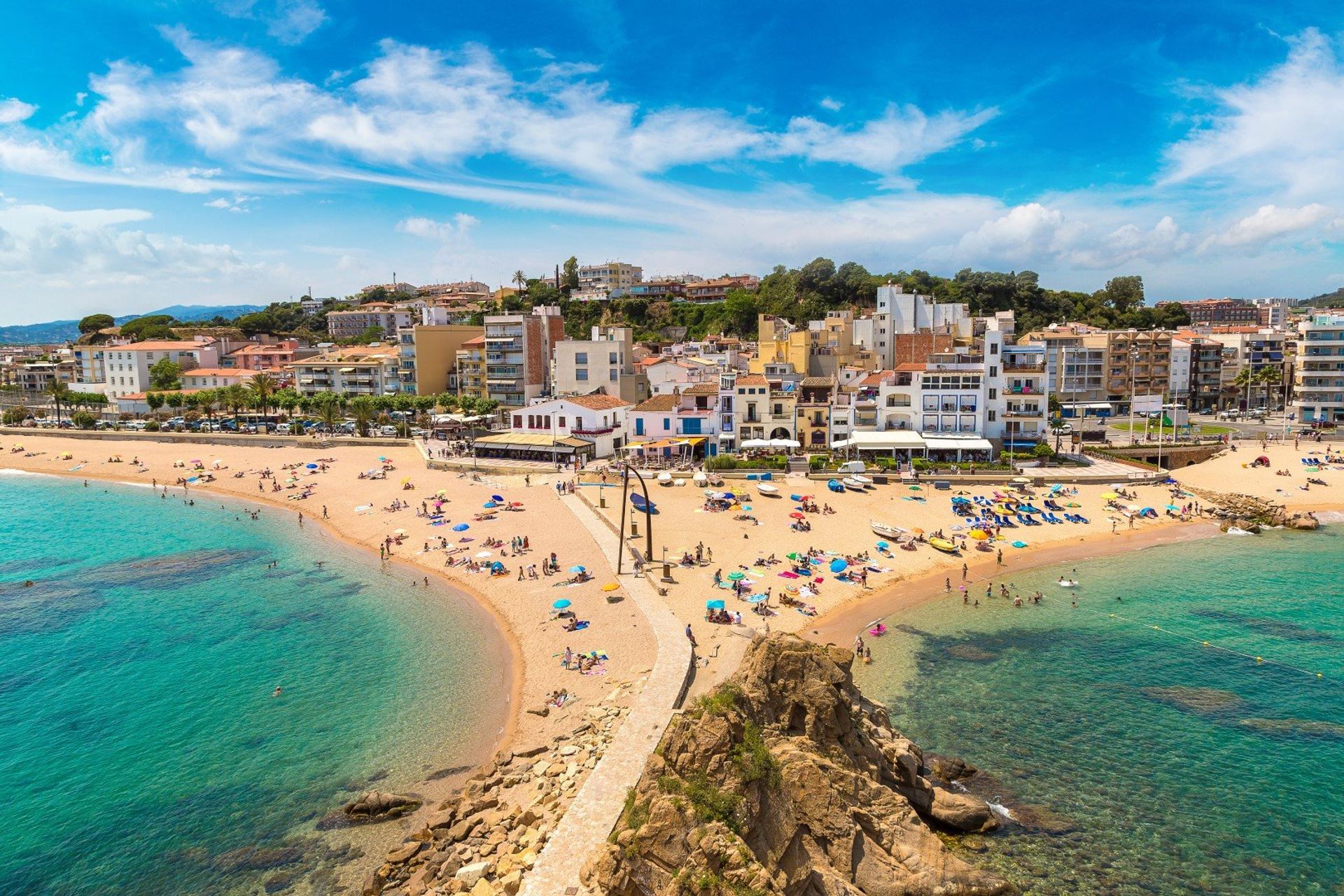 Blanes' Mediterranean charm seen through the traditional whitewashed houses along the seafront