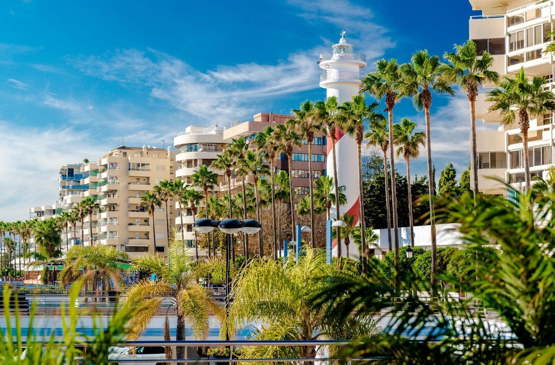 The luxury palm-lined, terraced apartment rentals along Marbella's coast