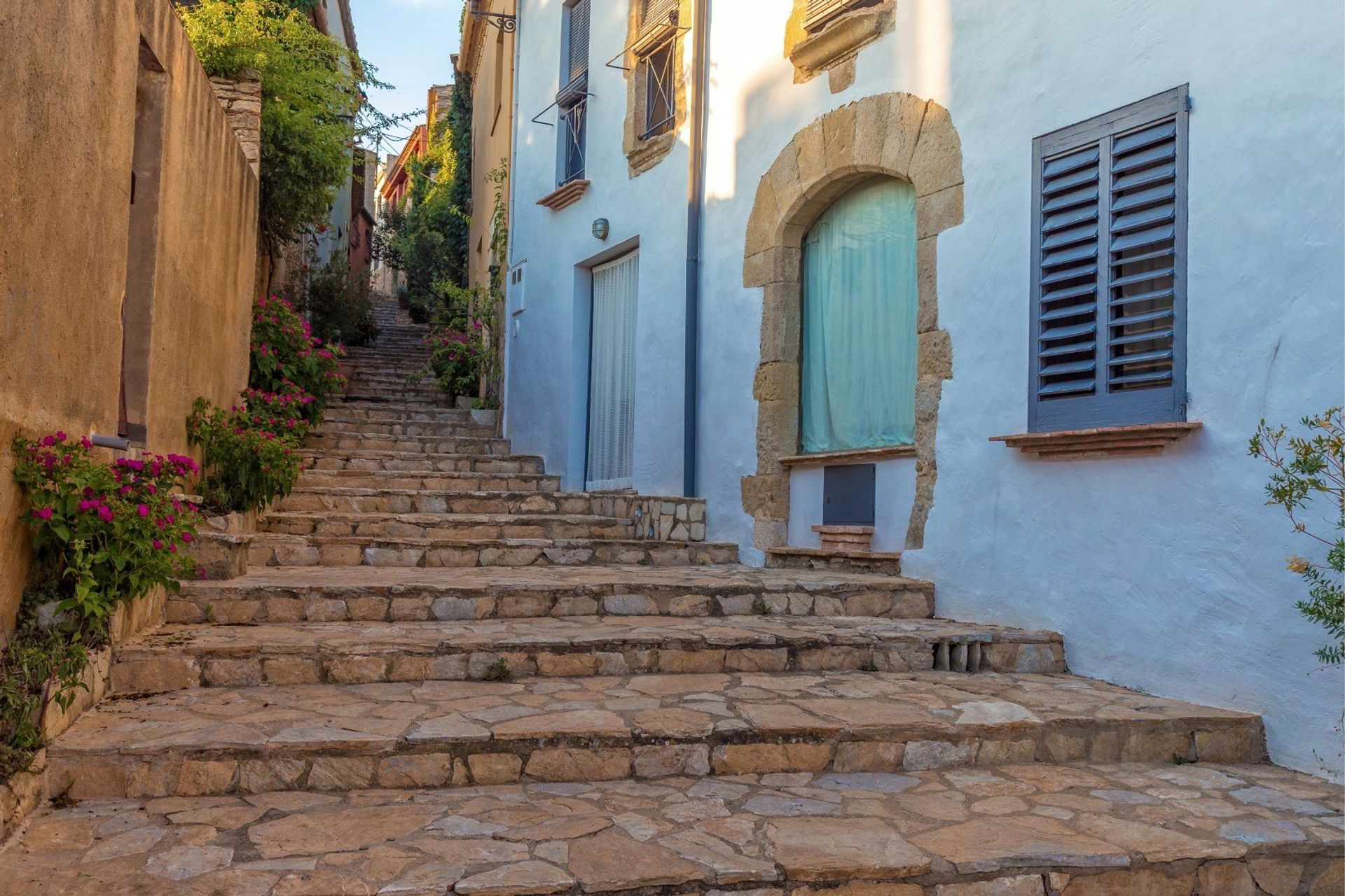 Begur boasts old town charm, seen in the cobbled, flower-lined side streets and painted houses