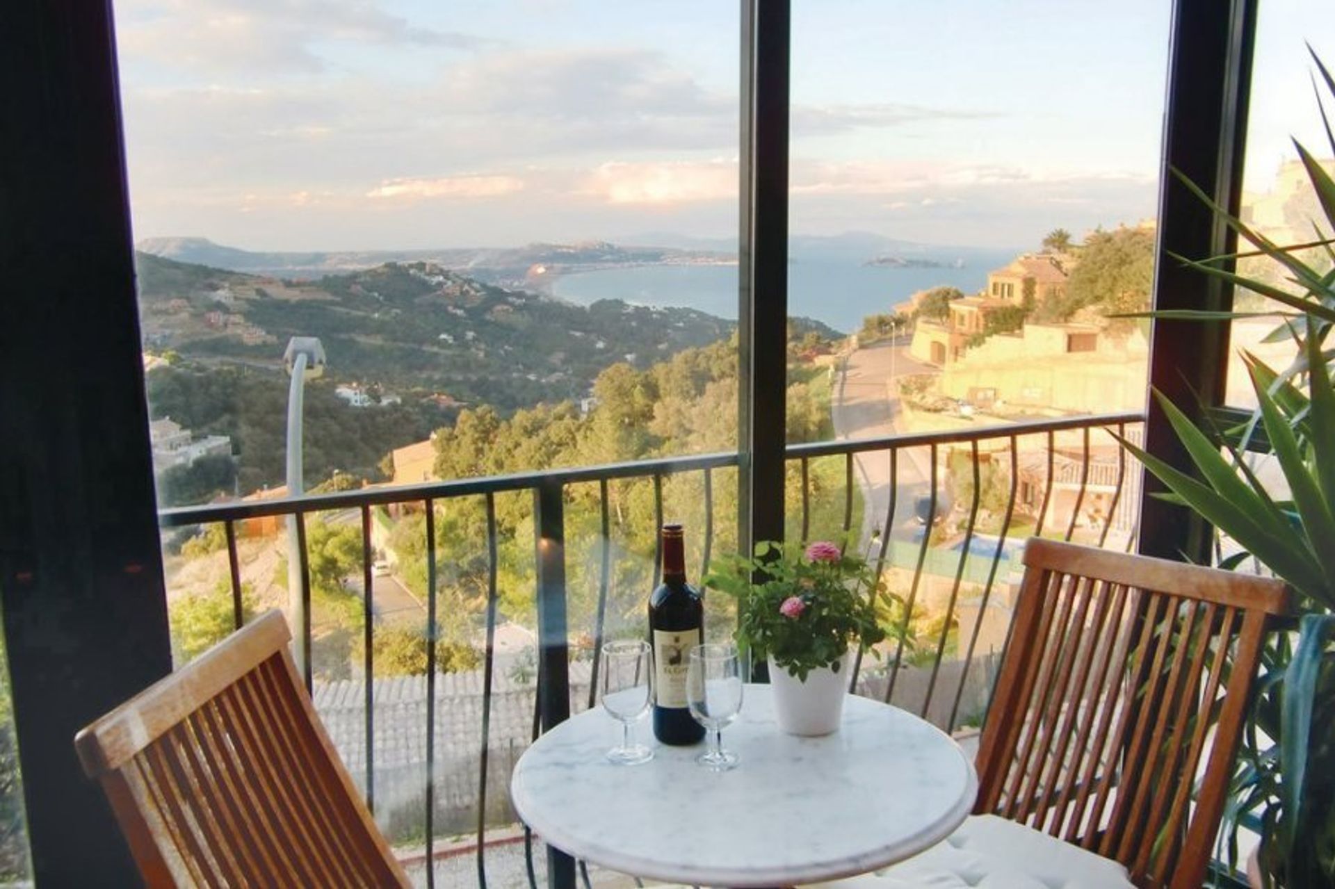 Feel the fresh mountain air from this luxury terraced villa overlooking the Costa Brava coast
