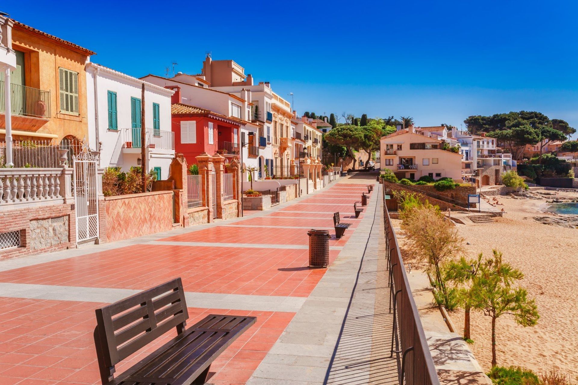 The colourful tiled promenade connects to many of the town's beaches