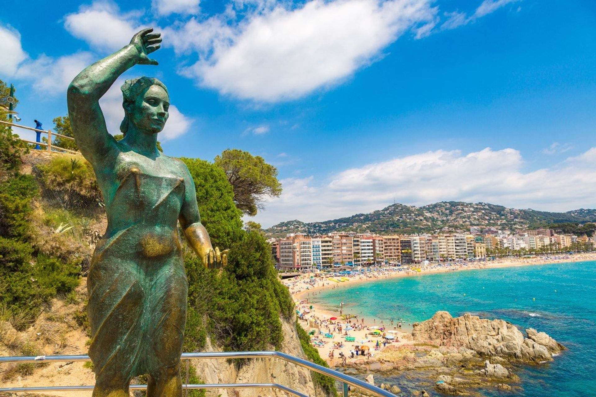 The Dona Marinera (Fisherman's Wife) statue has become an icon overlooking Lloret Beach