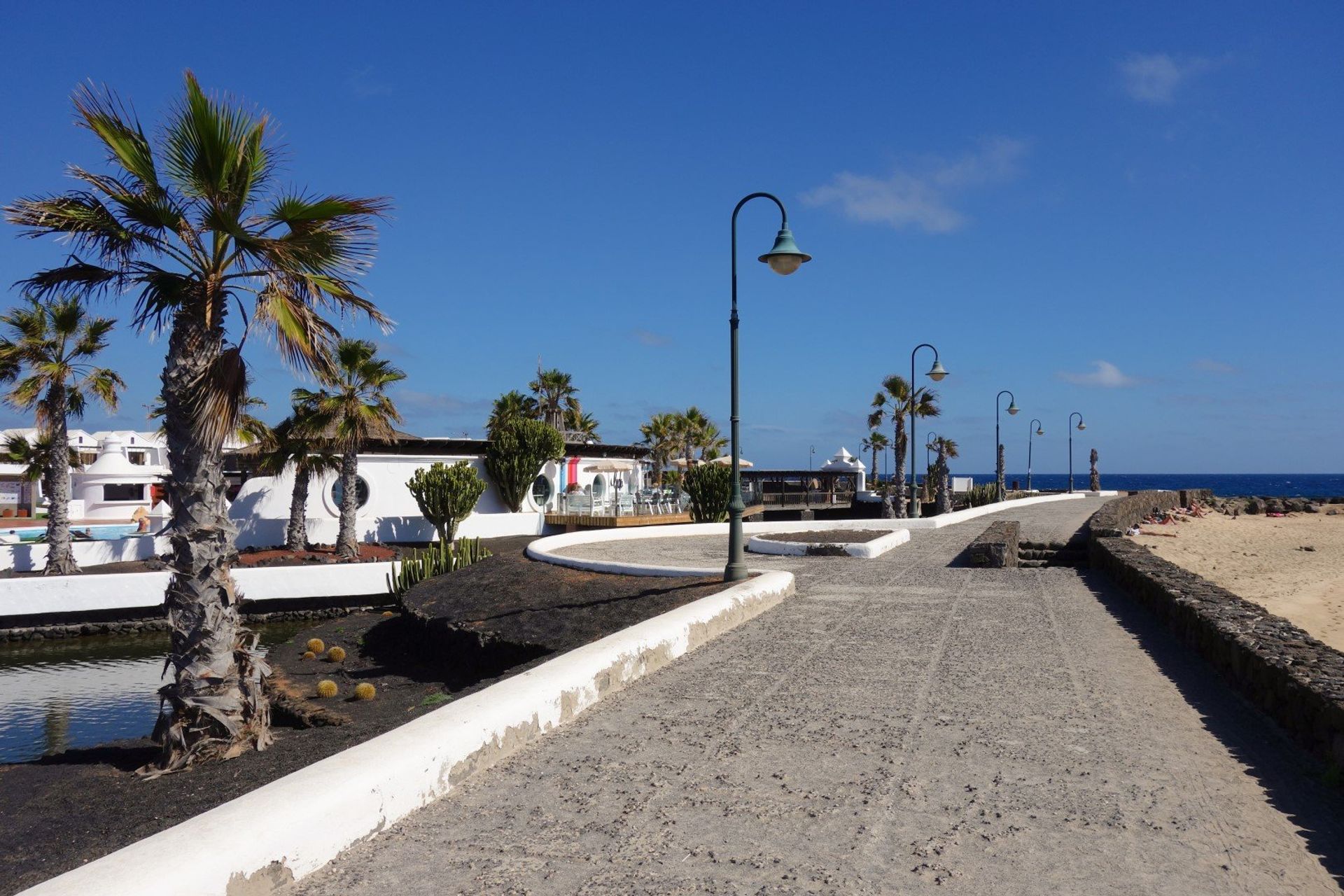 Take an evening stroll down the beach promenade after a delicious meal of local seafood