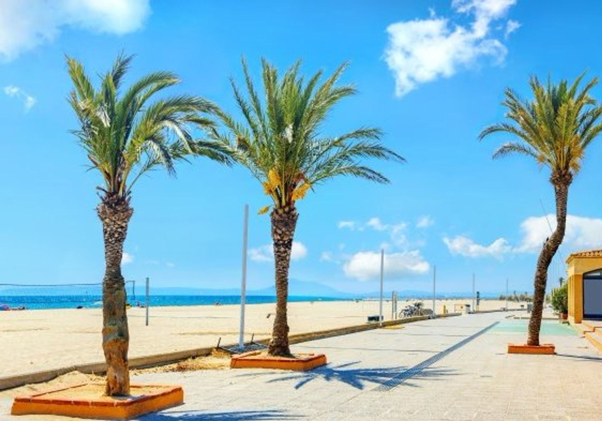 Palm-lined Playa de Empuriabrava Blue Flag beach