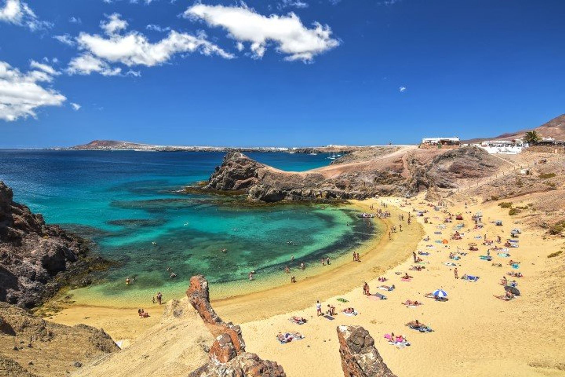 Papagayo beach is a crescent of fine white sand, surrounded by Los Ajaches Natural Park