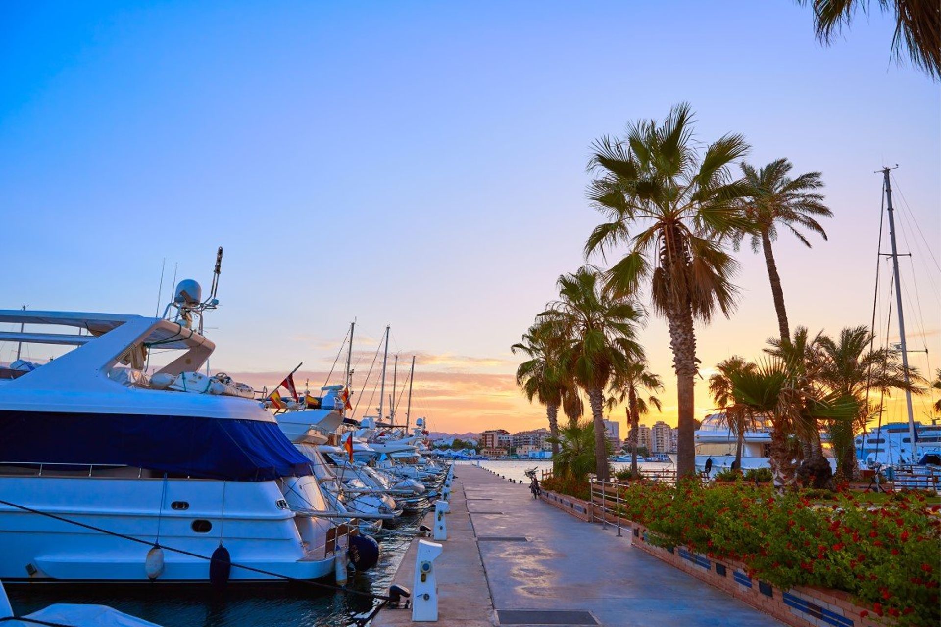 Take a stroll along the marina at night and feel the authentic atmosphere of a typical Mediterranean coastal town