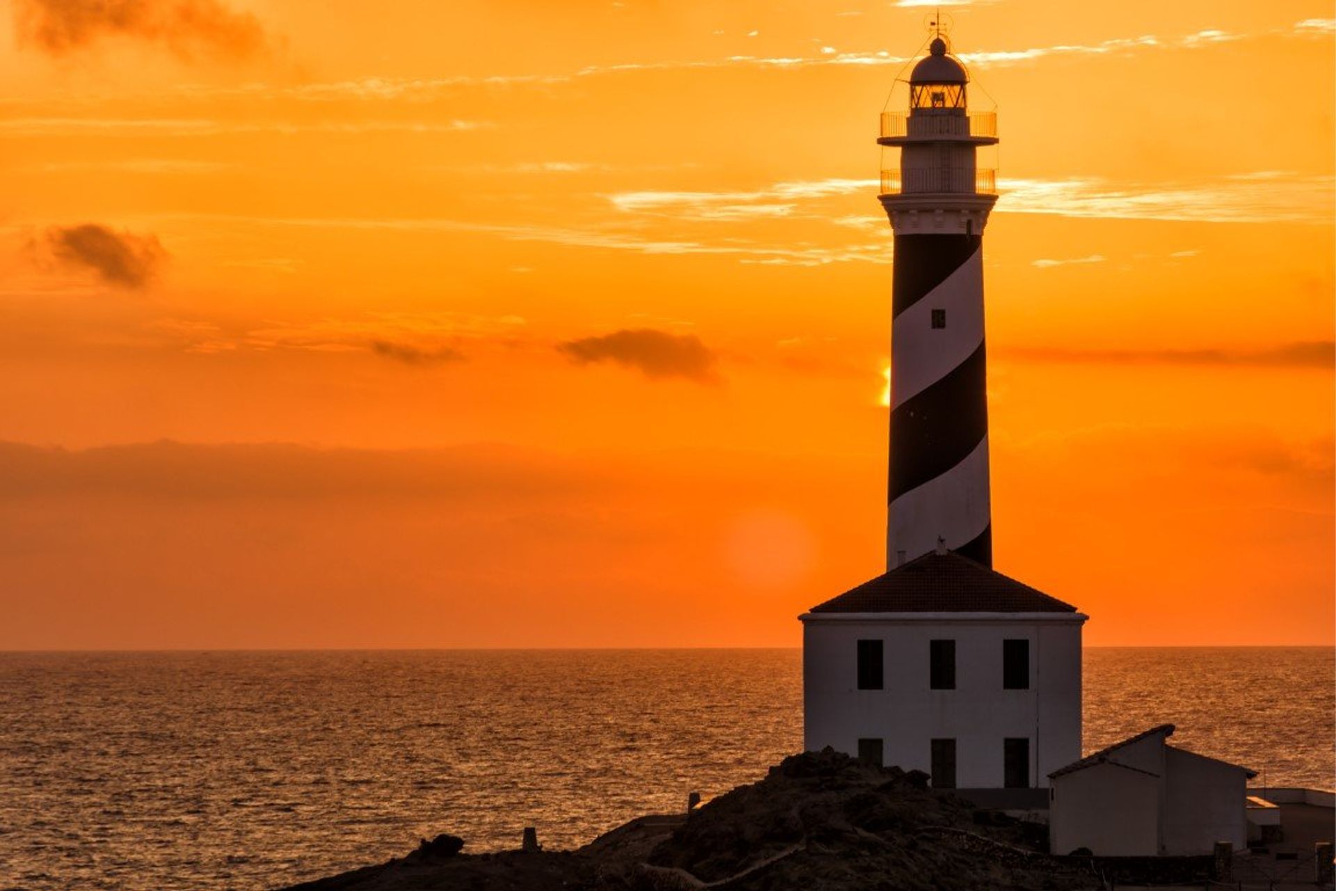 Cap de Farvàritx lighthouse in the S’Albufera nature reserve, north eastern Menorca