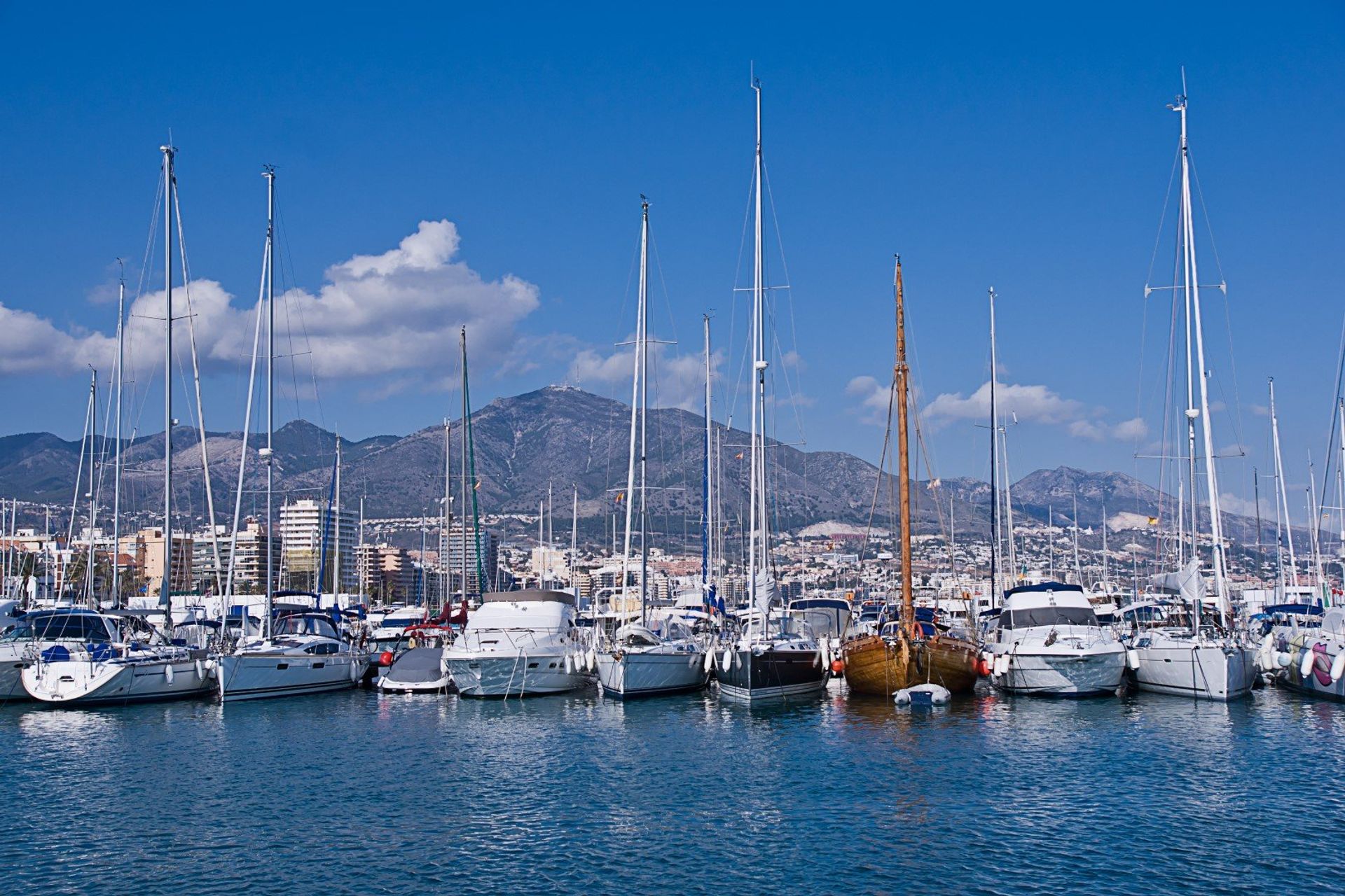 Watch the world go by as you stroll along the fishing boats dotted along Fuengirola's harbour