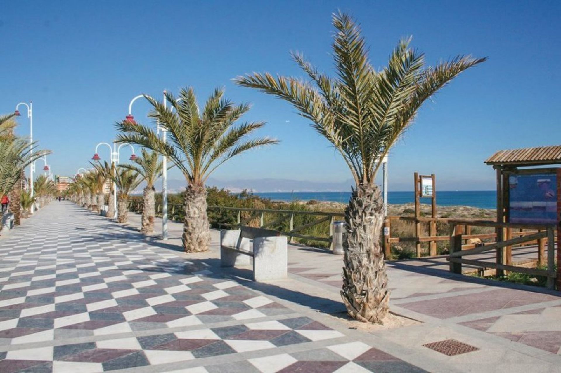 The wide promenade has all the holiday amenities of a modern coastal town