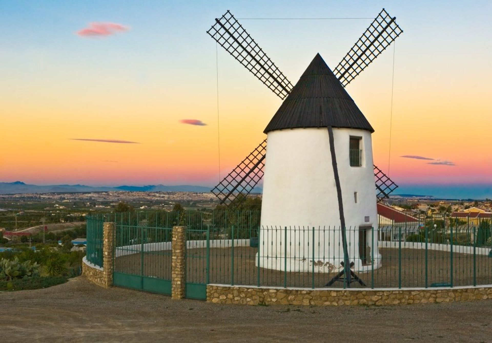 Molino de Viento Windmill is the village's landmark, offering panoramic views of the surrounding countryside