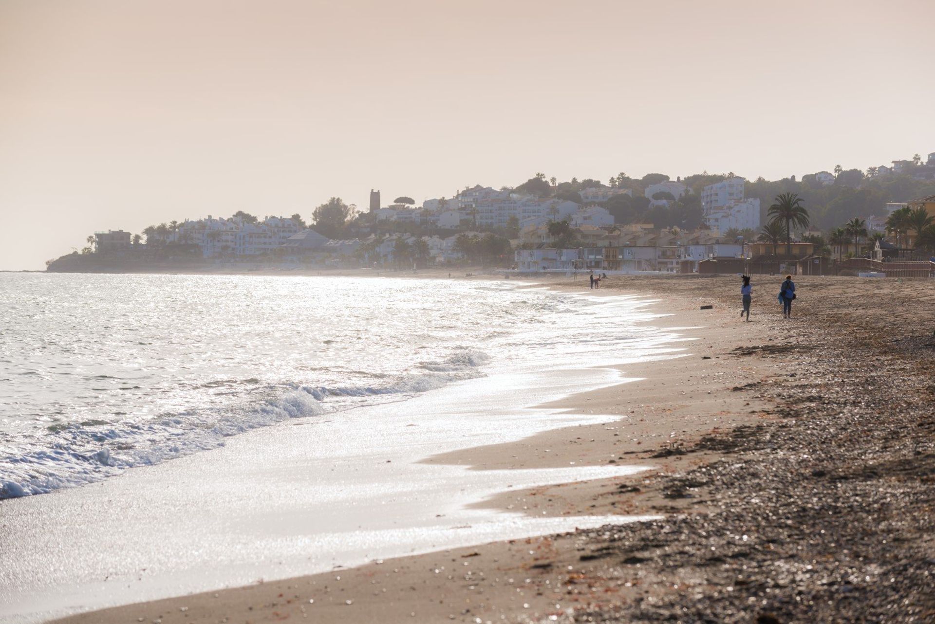 After a long day under the sun, have an evening stroll down peaceful sandy Mijas beach