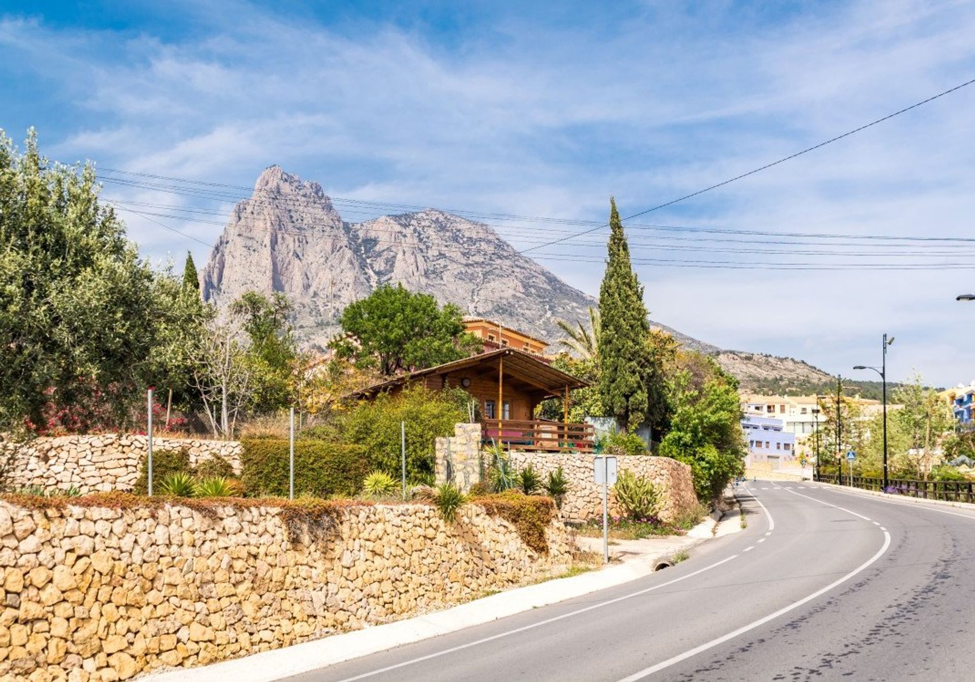 Puig Campana towers over the village at 1406m tall - a paradise for hikers and climbers