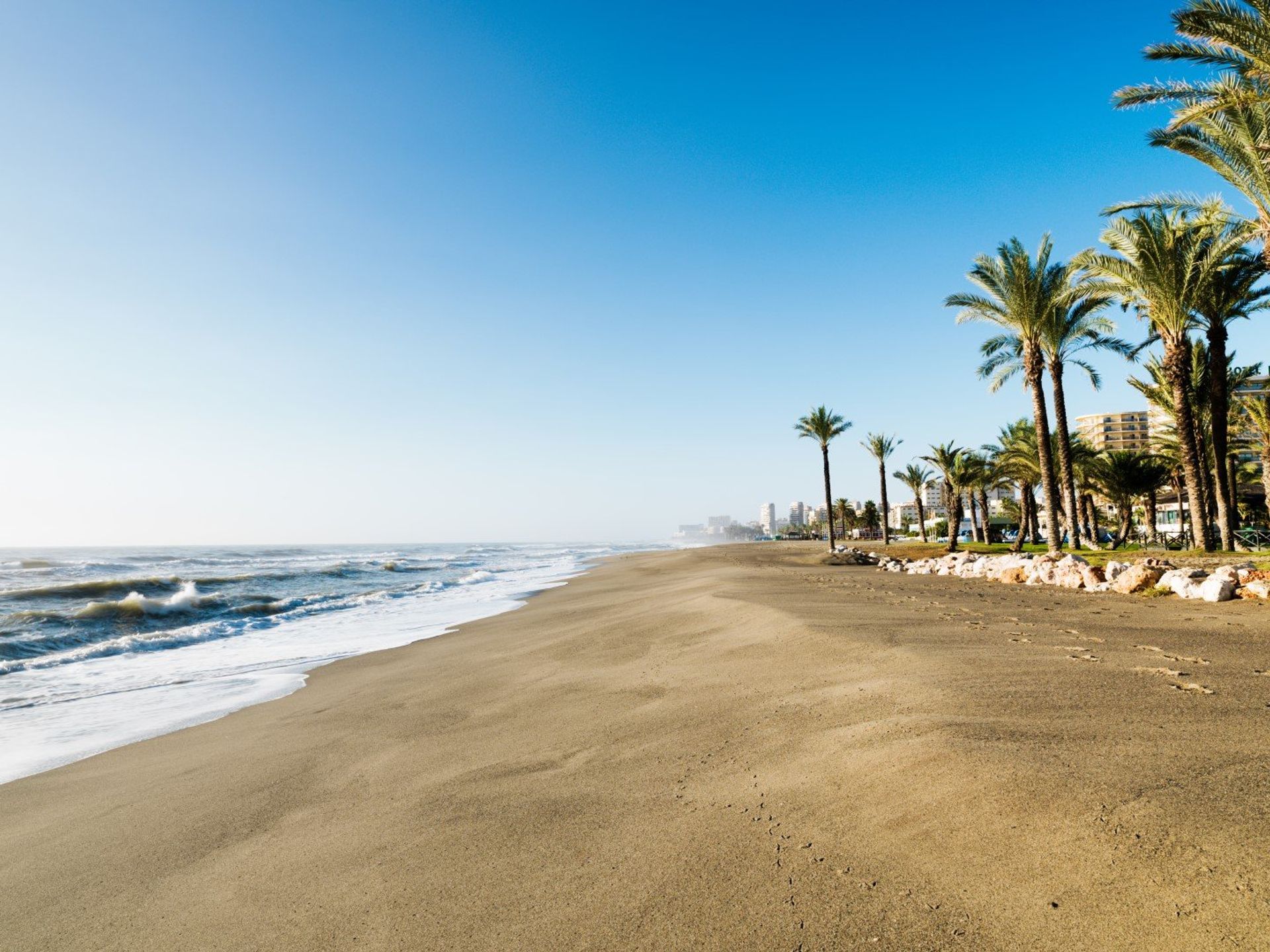 With golden sands and aquamarine waters, La Carihuela beach is the perfect spot for a lazy day by the coast