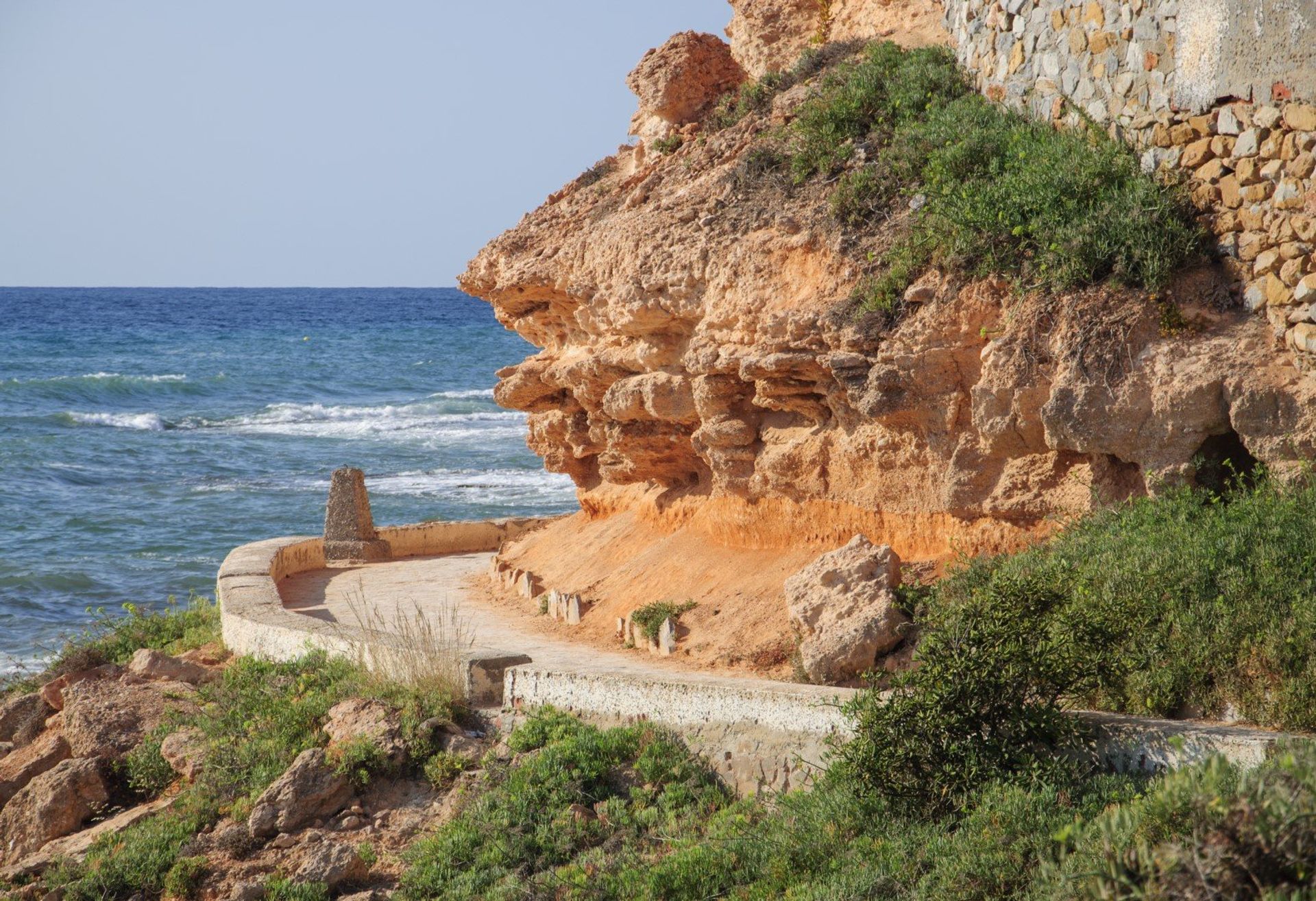 A path along La Zenia's coastline is a perfect place to explore its hidden coves and cliffs with beautiful views of the Mediterranean
