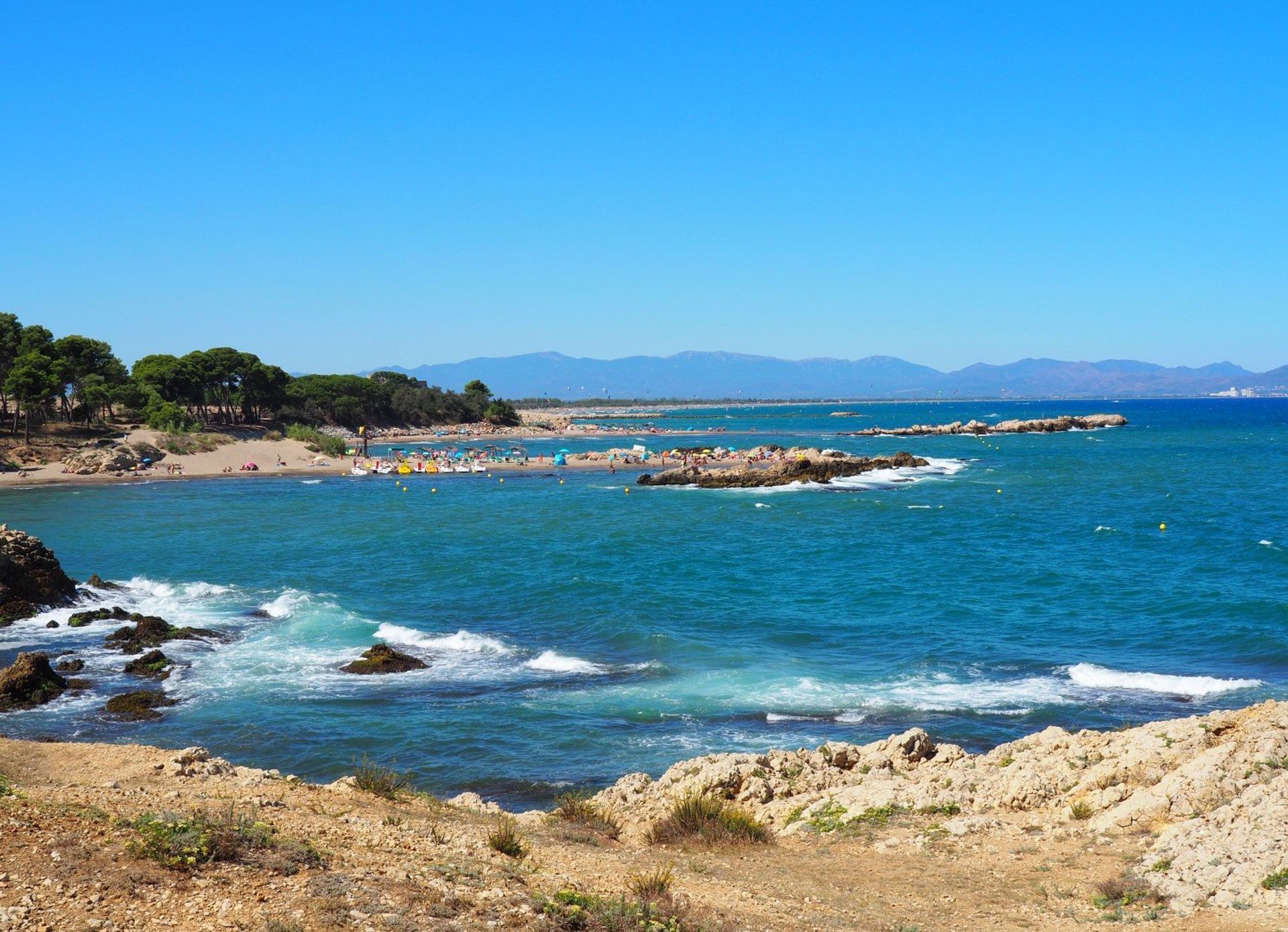 People watch, sit and relax or simply bask in the Mediterranean sun on the family-friendly Portitxol beach