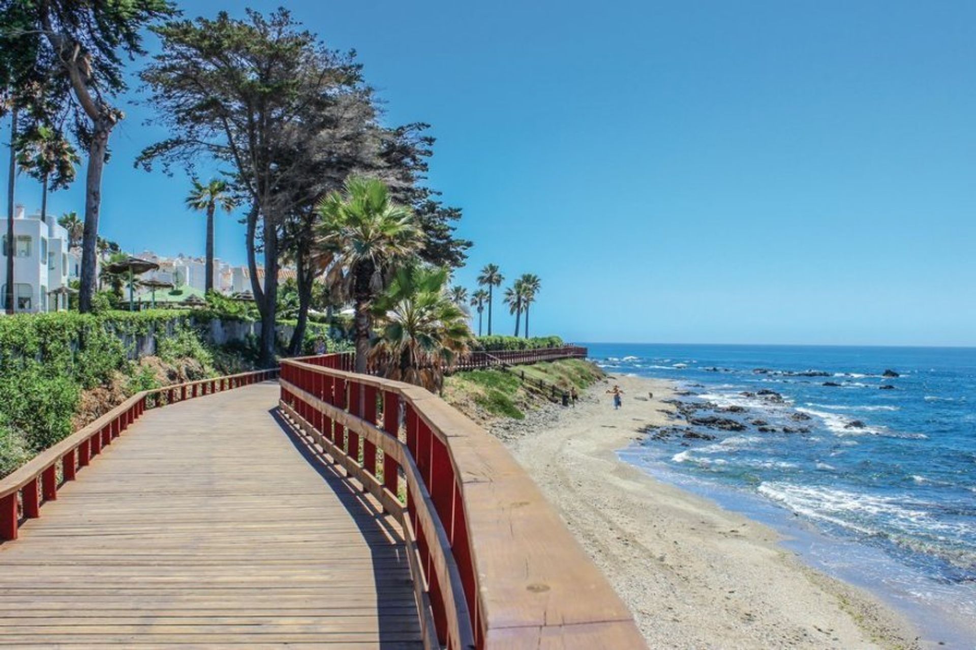 Take a relaxing stroll down the beach promenade with a backdrop of the sparkling Mediterranean 
