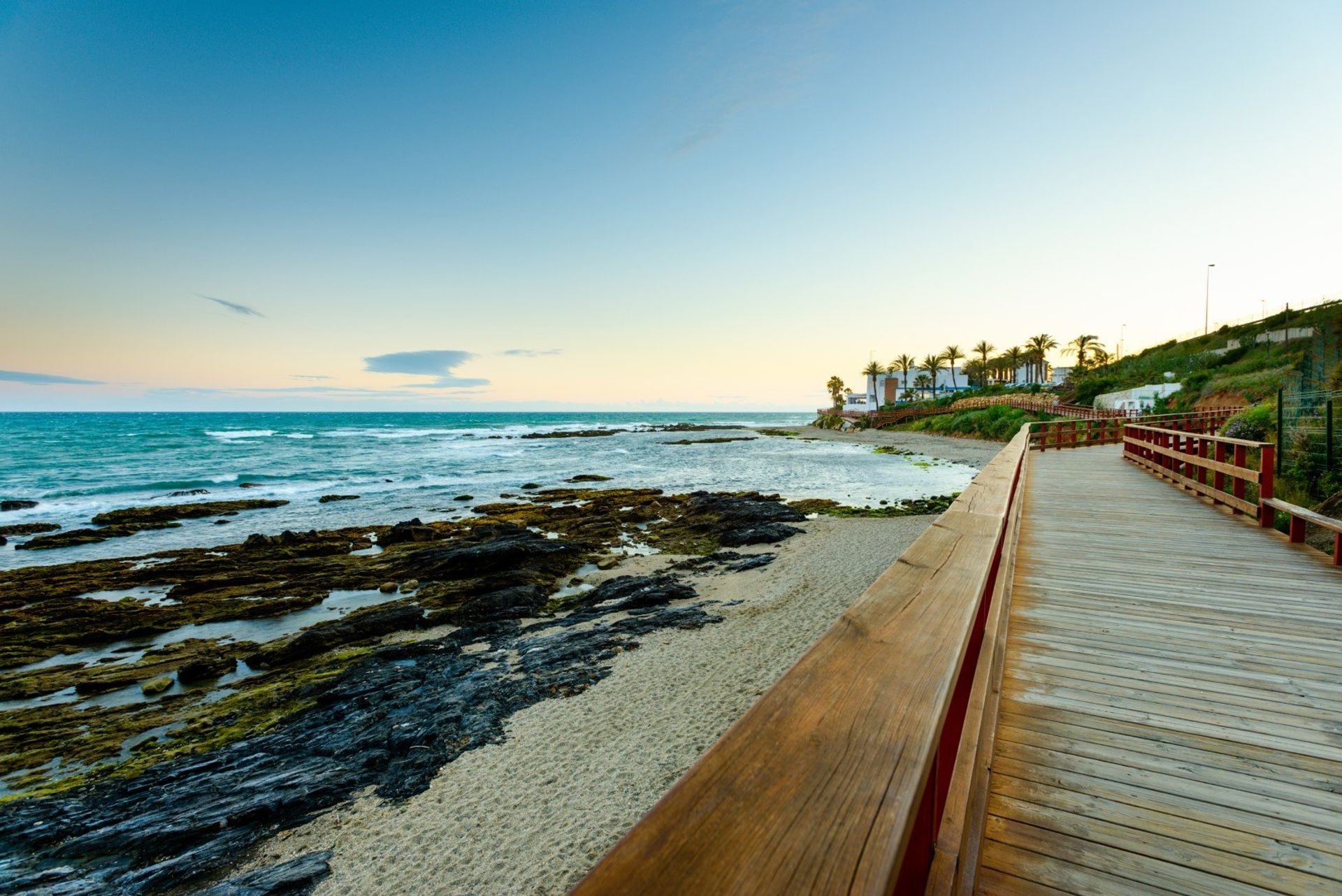 Take a sunset stroll down the beach promenade that runs along the coast to Mijas village