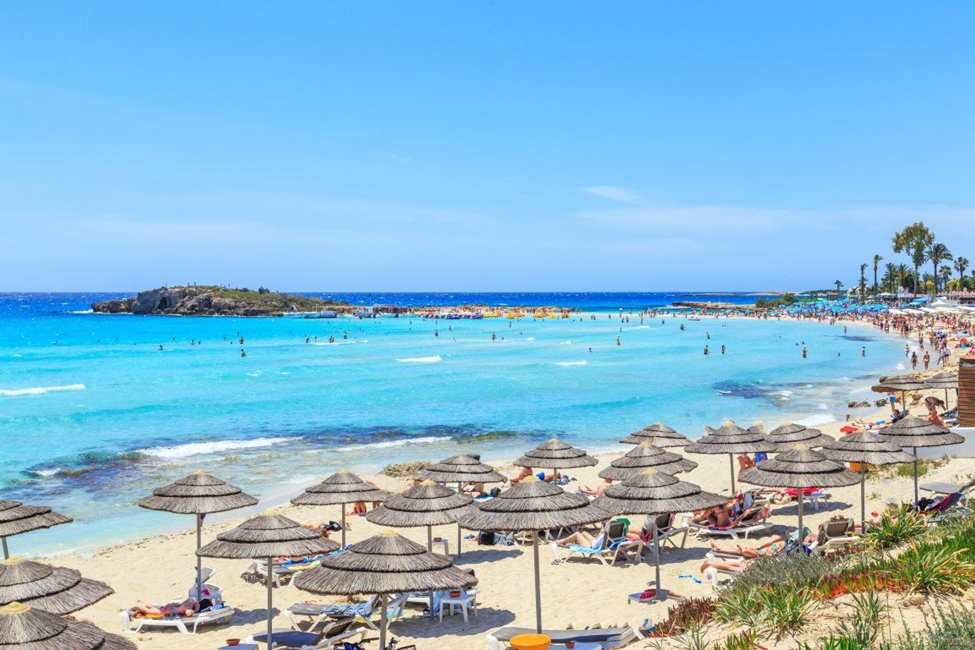 Nissi beach in Ayia Napa is the most famous on the island, lively with bars and sunbathers