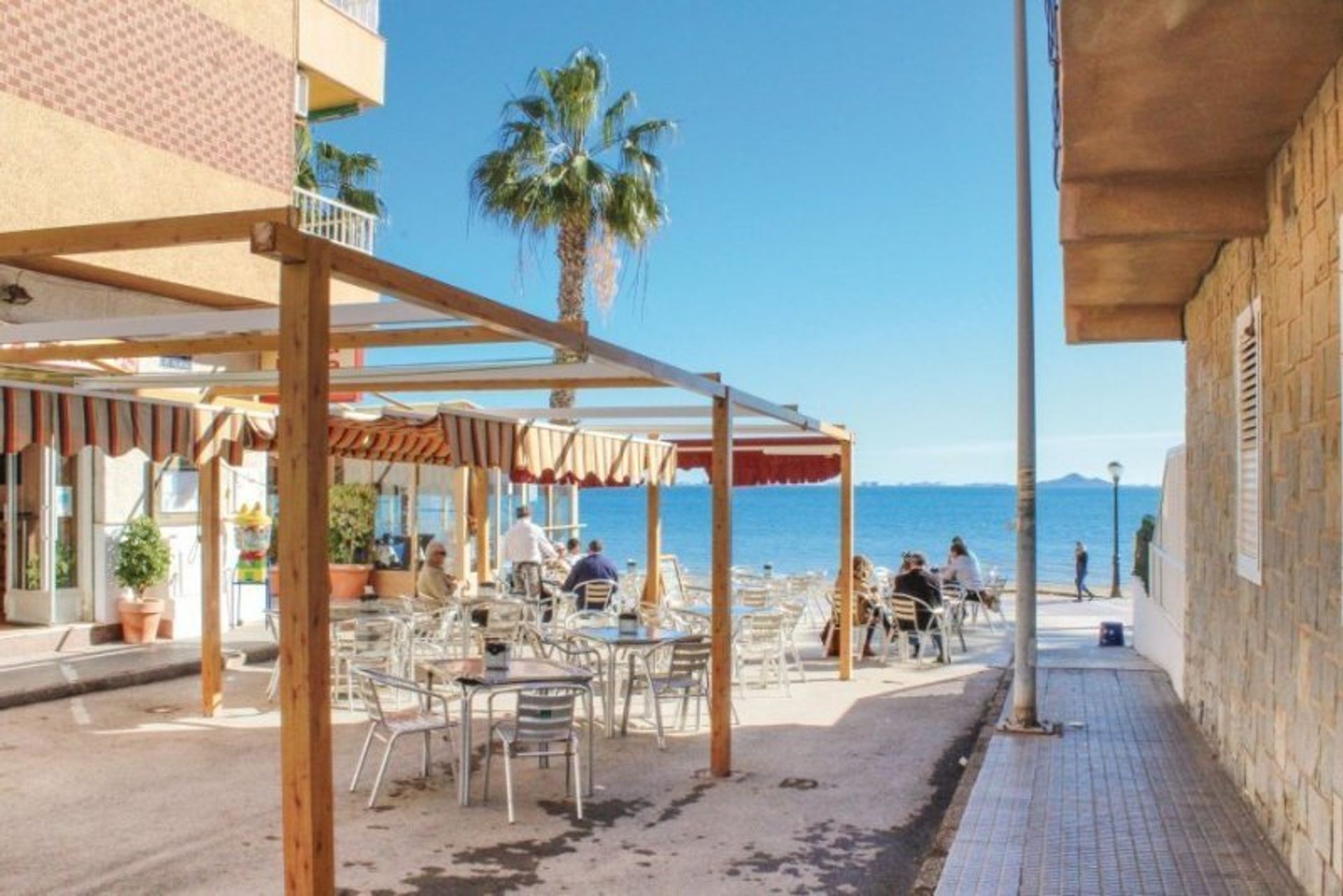 Enjoy glorious views of the coast from one of the many tapas bars dotted along Alcazares' seafront promenade
