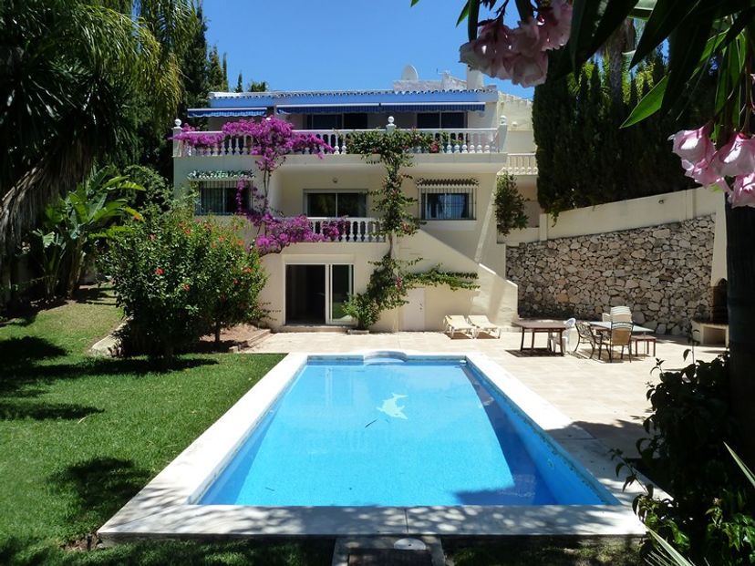 Villa in Urbanización el Rosario, Spain: View of rear garden, swimming pool and back of villa