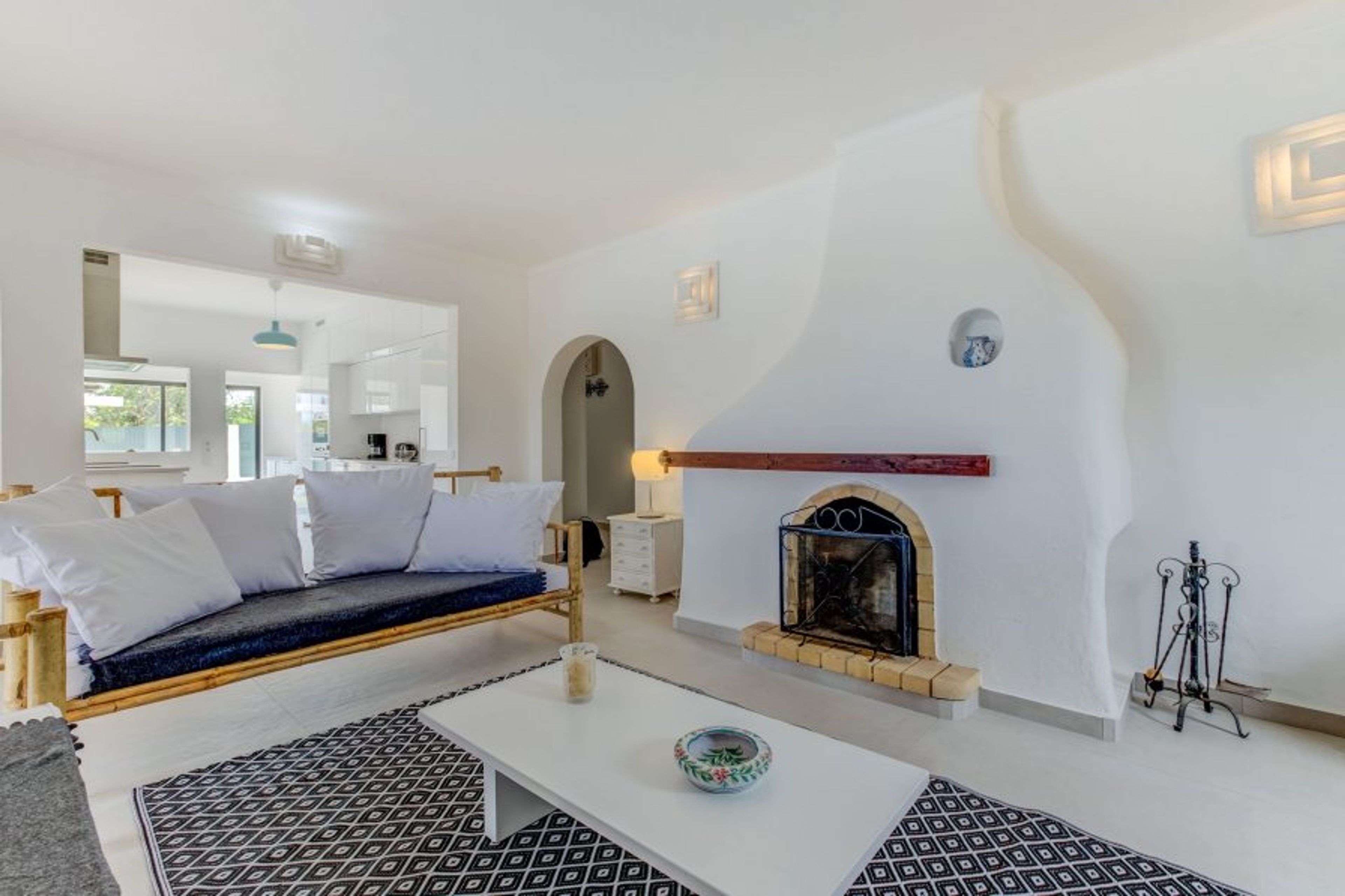 Lounge has open fire, TV and patio doors to outside