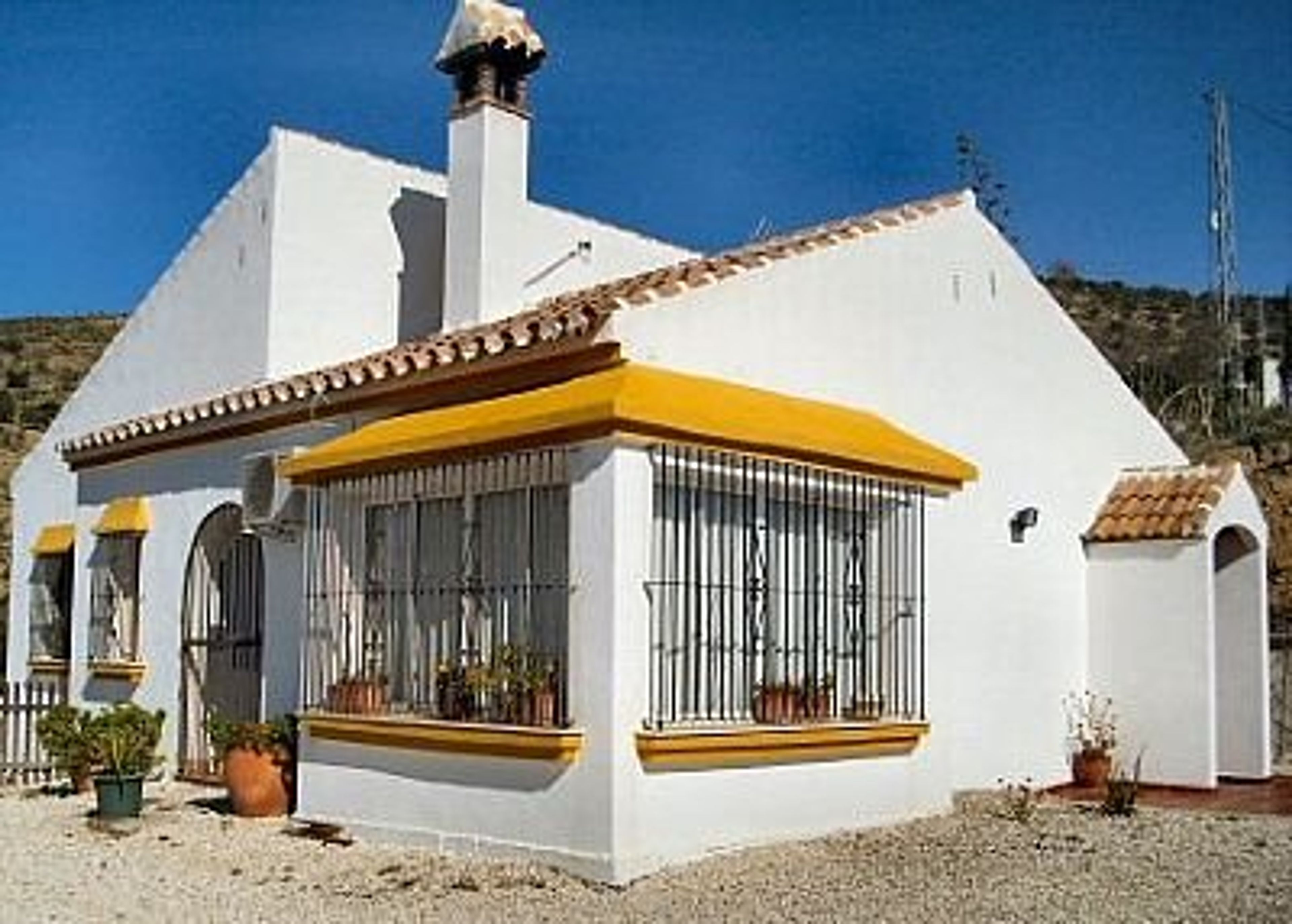 External view of house showing picture windows