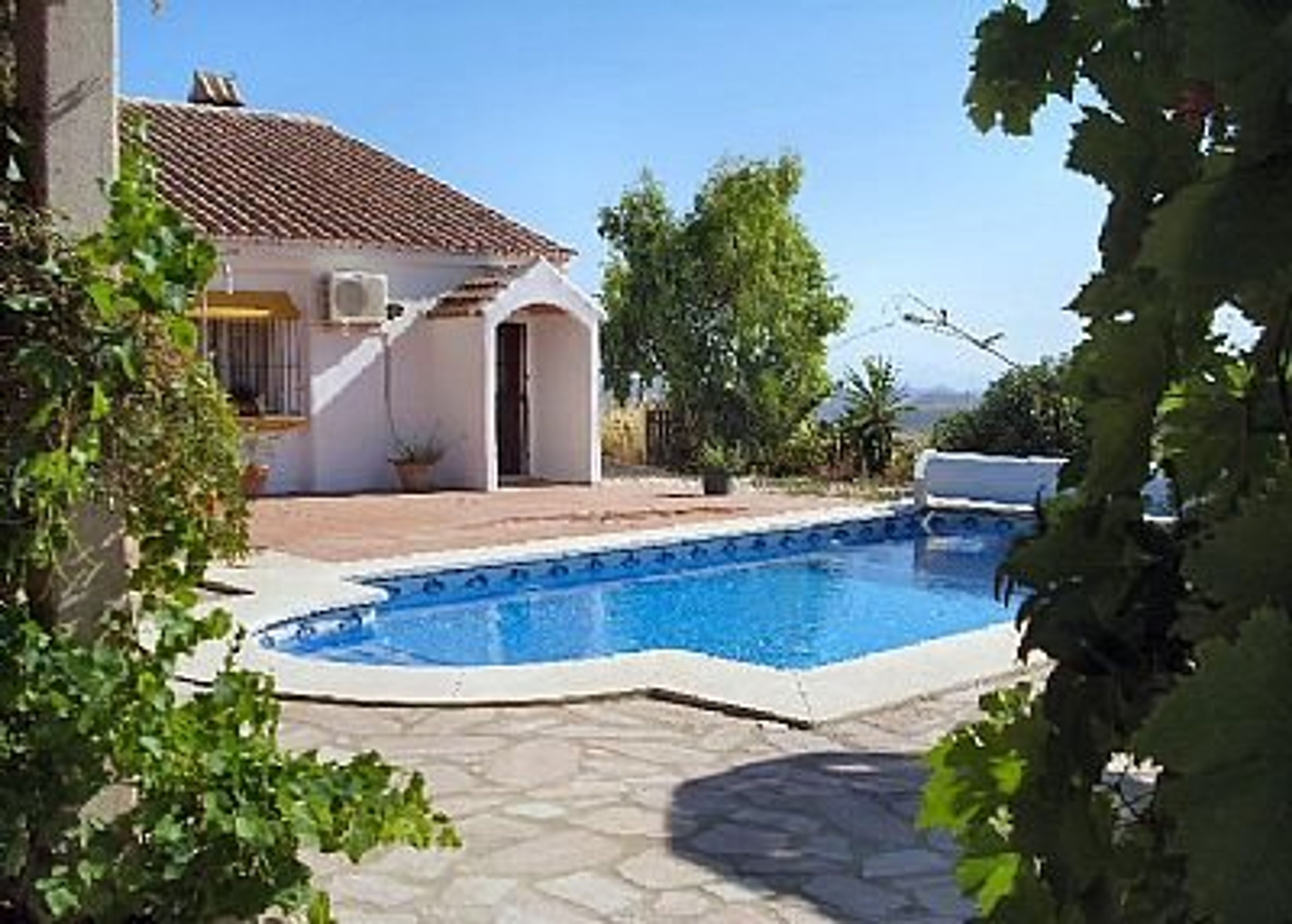 View of pool and side of Casa Sofia