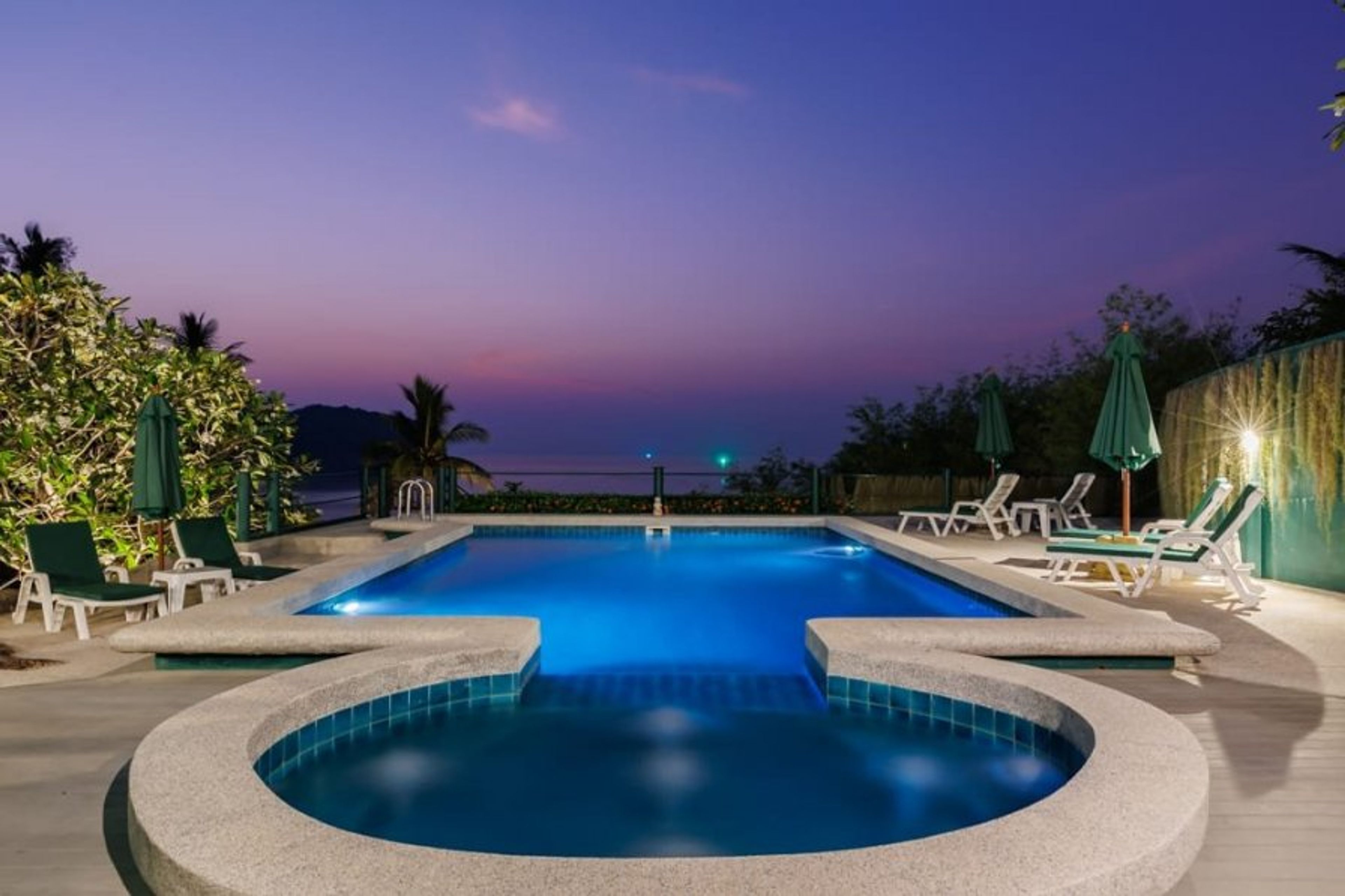 The pool area elegantly positioned on the middle tier of the estate.