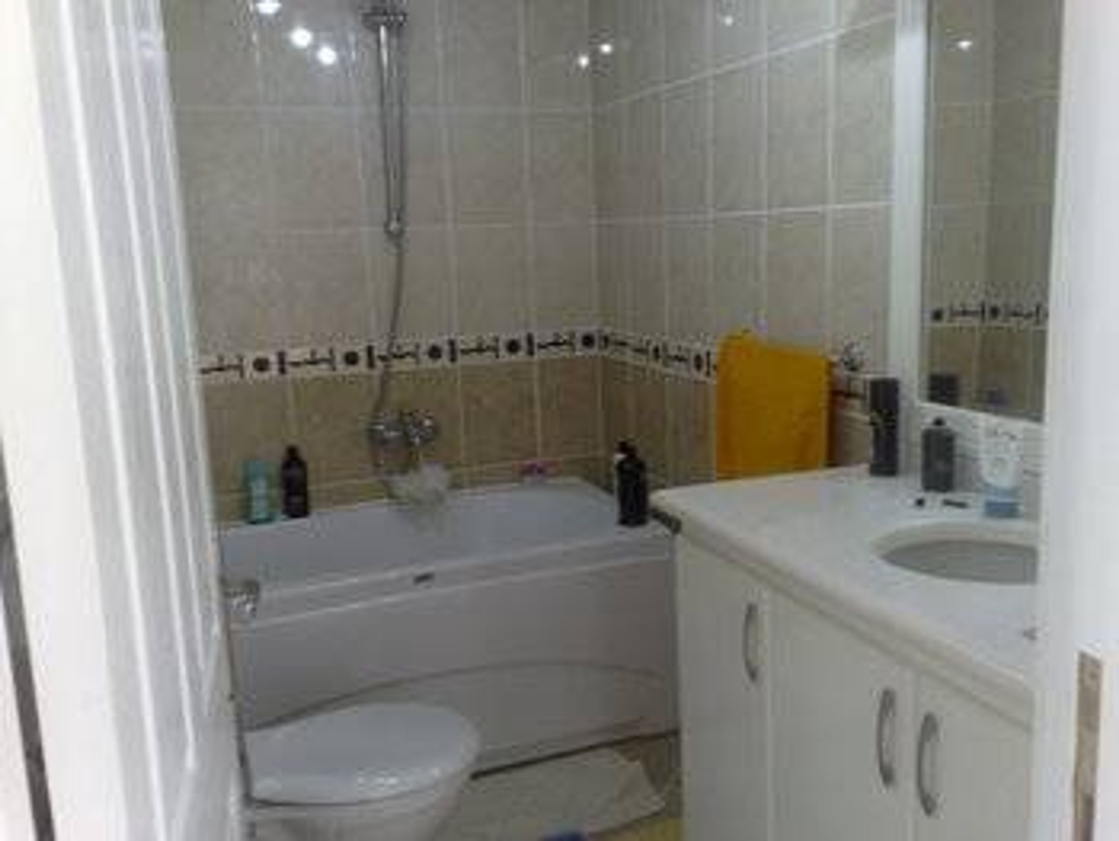 Fully tiled bathroom