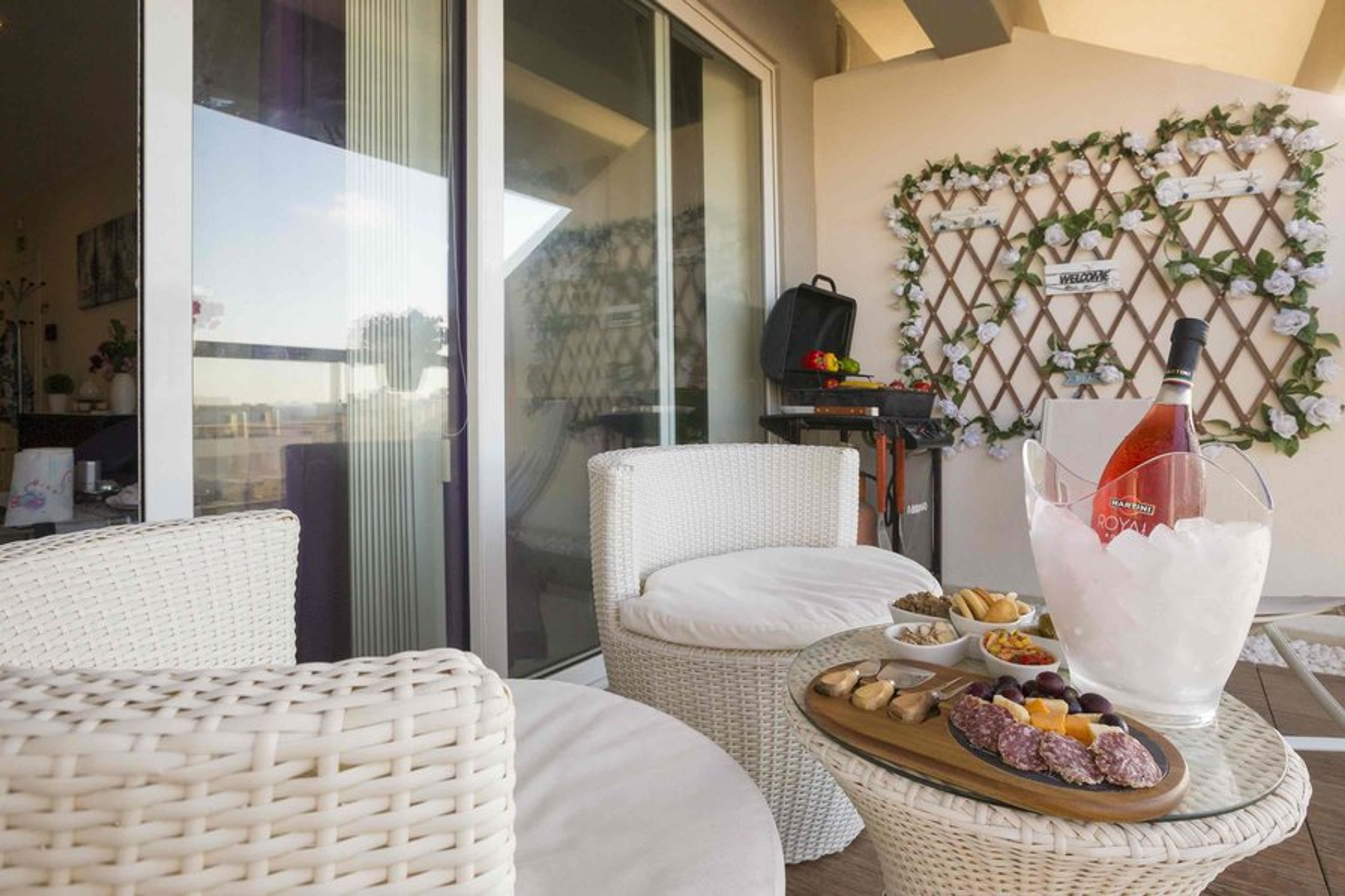 Balcony Area with outdoor furniture and BBQ