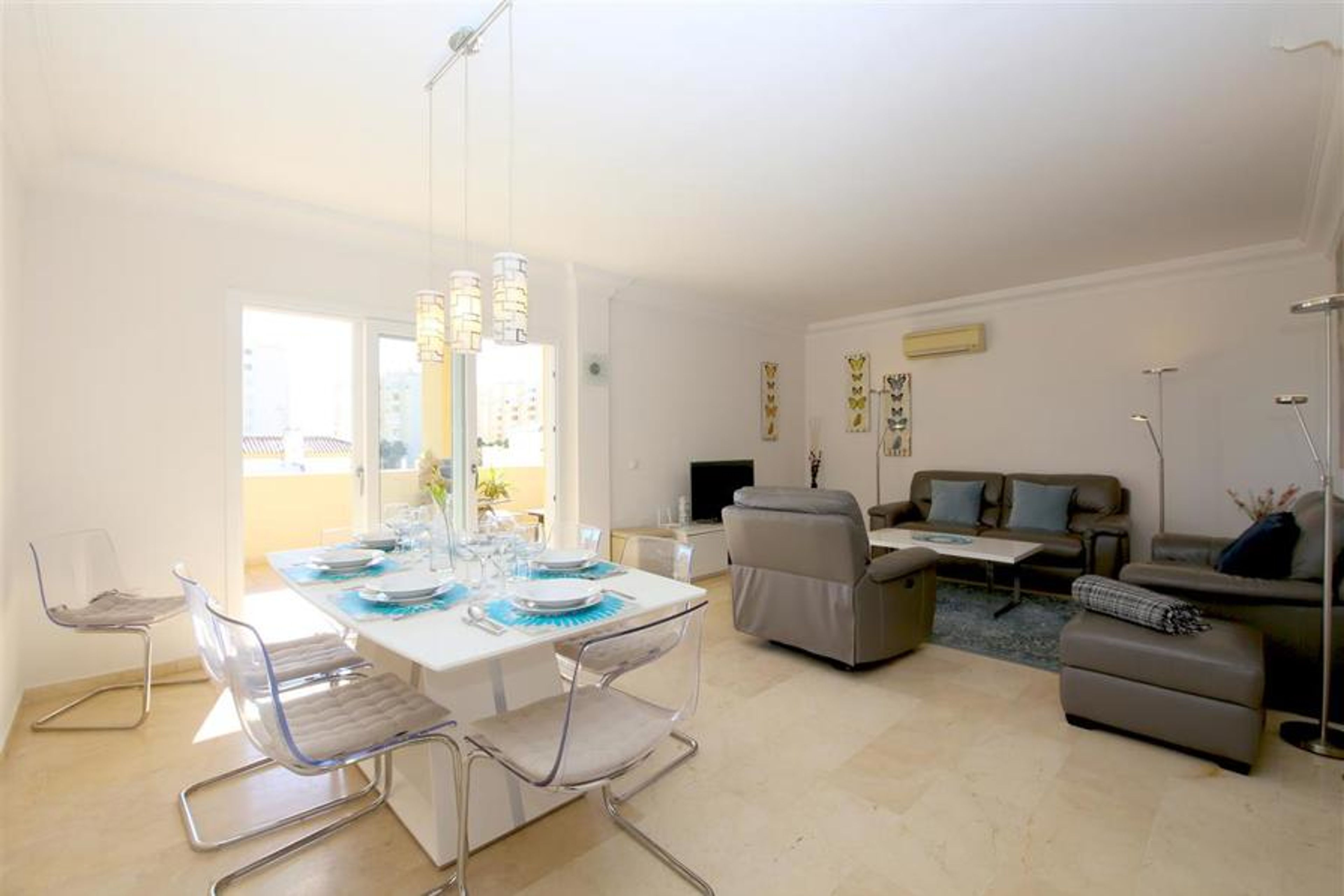 Full view of the lounge and dining area with acces